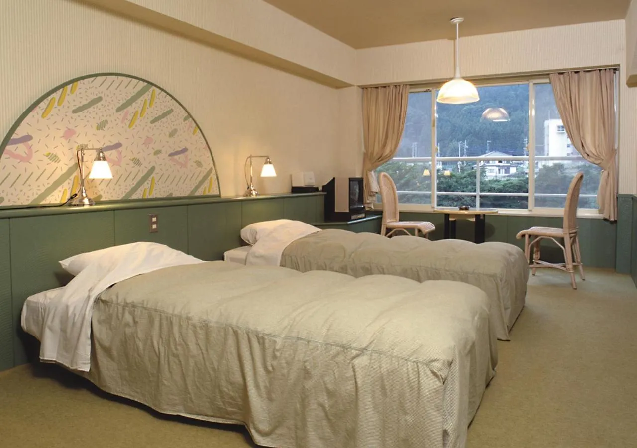 Bed in Tabist Kinugawa Park Cottage