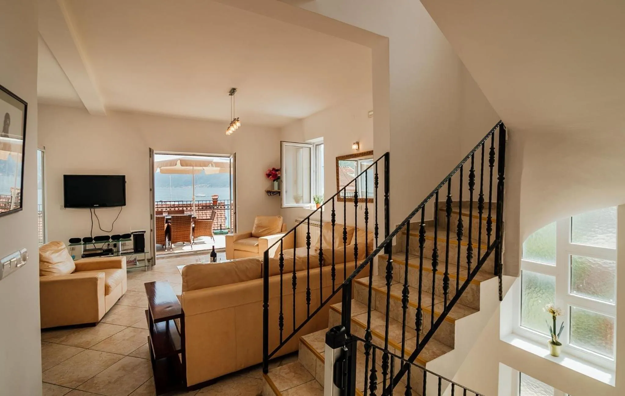 TV and multimedia in Spacious Family 4BR Seaside House, Fantastic Sea Views, 20 Meters to Beach