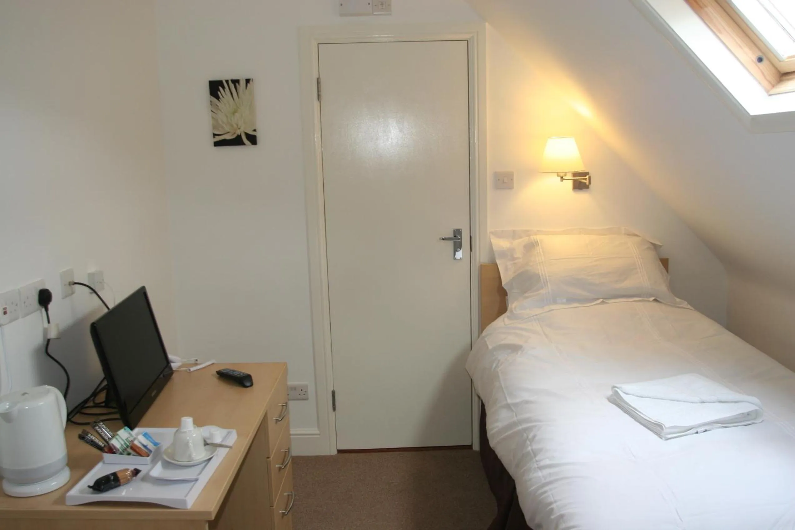 Bedroom in Clifton Lodge Hotel