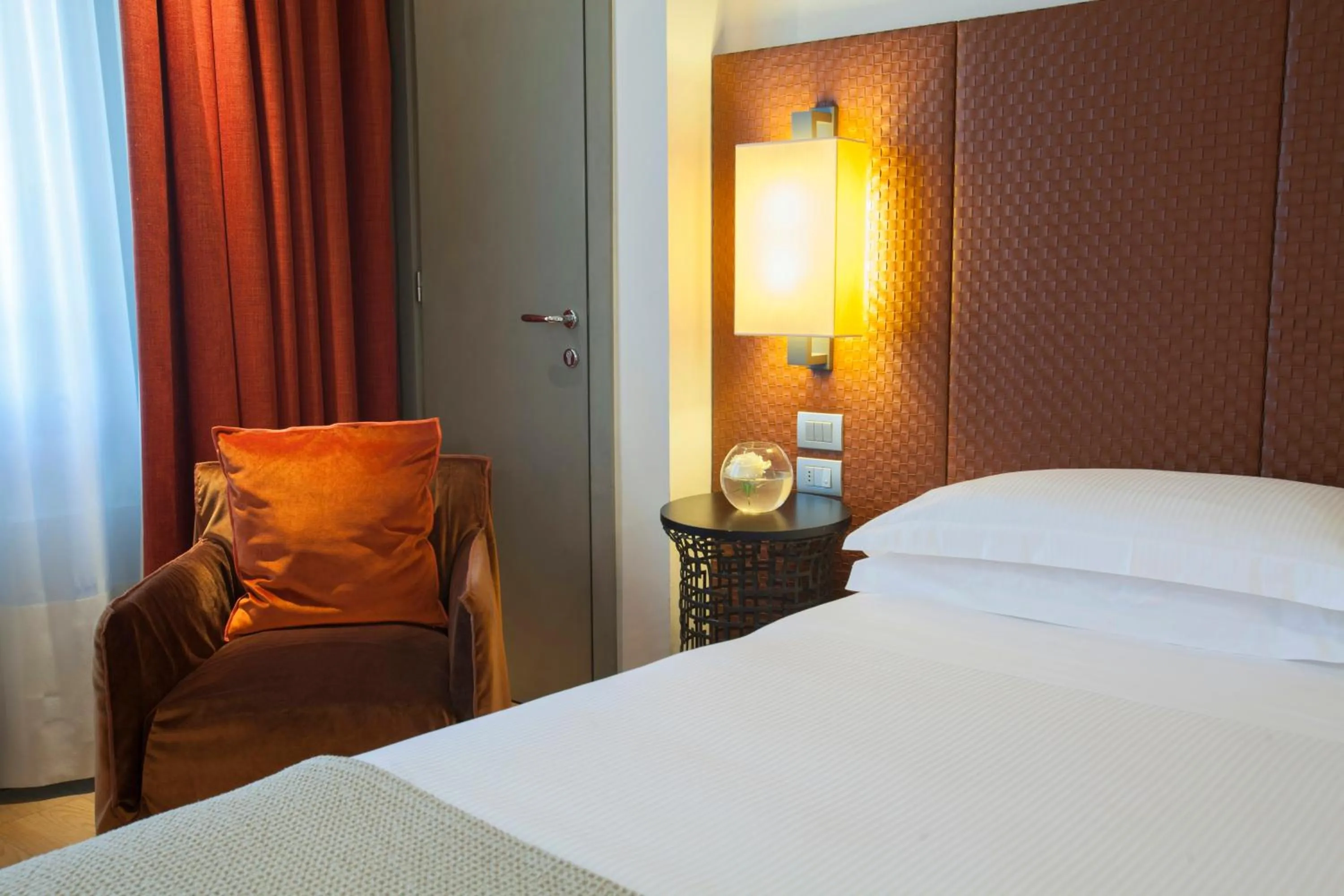 Photo of the whole room, Bed in Starhotels Michelangelo Florence