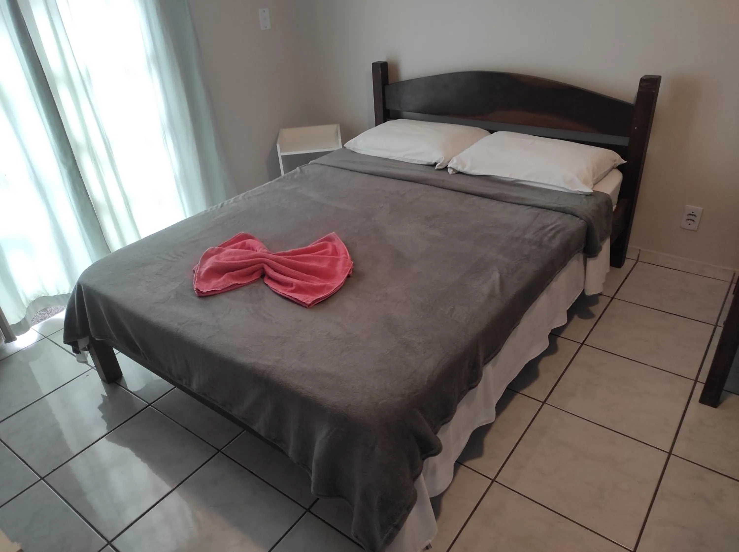 Bed in Pousada Laguna Beach Club