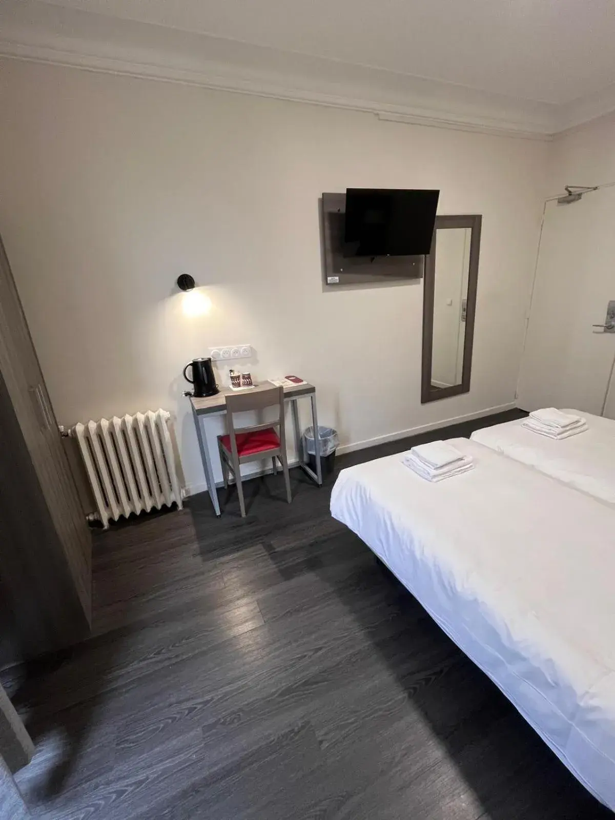 Bed in Hipotel Paris Voltaire Bastille Bed in Hipotel Paris Voltaire Bastille