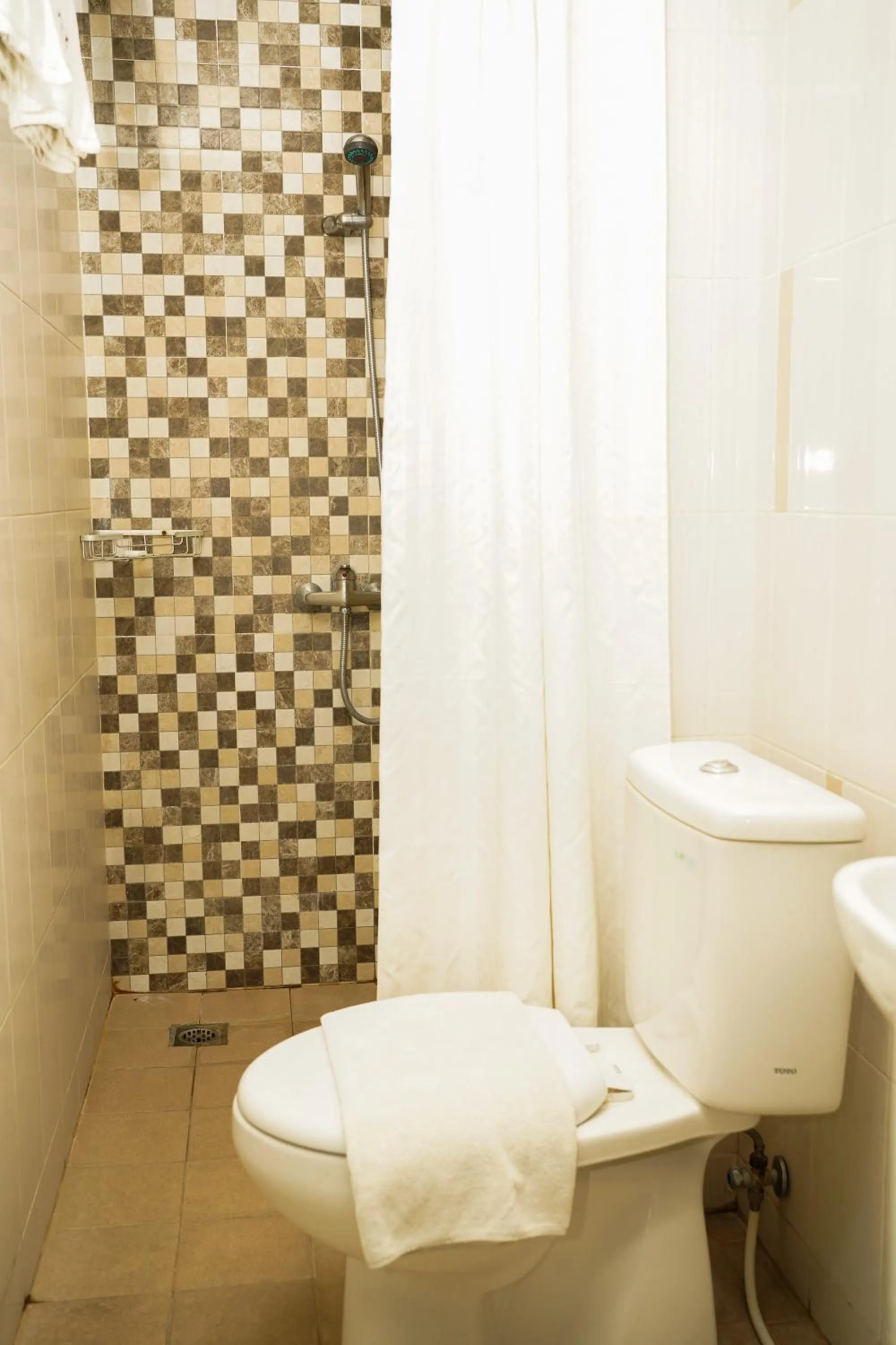 Bathroom in JLE'S Hotel