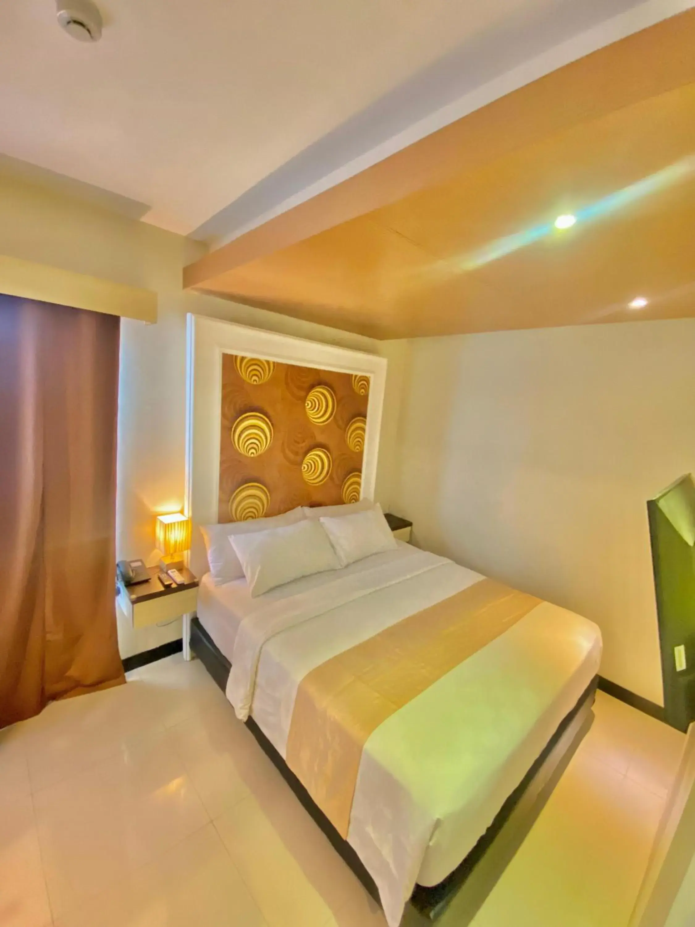 Bed in JLE'S Hotel Bed in JLE'S Hotel