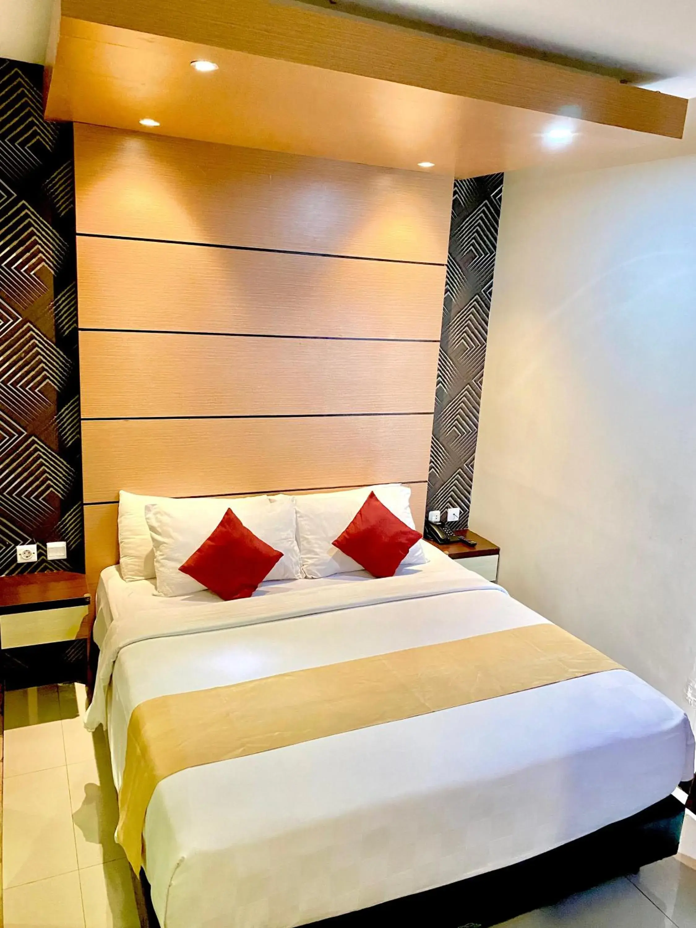 Bed in JLE'S Hotel Bed in JLE'S Hotel