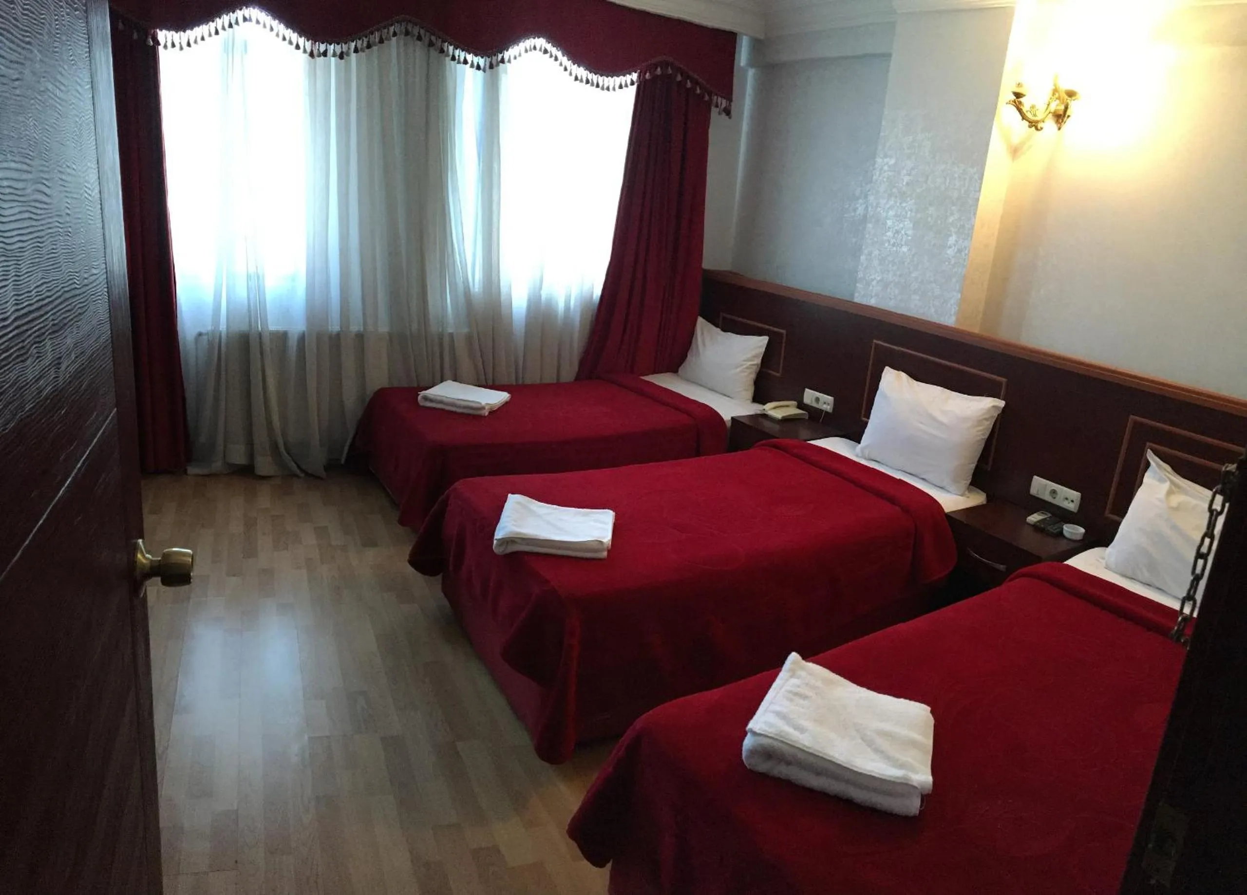 Bed in Red White Hotel