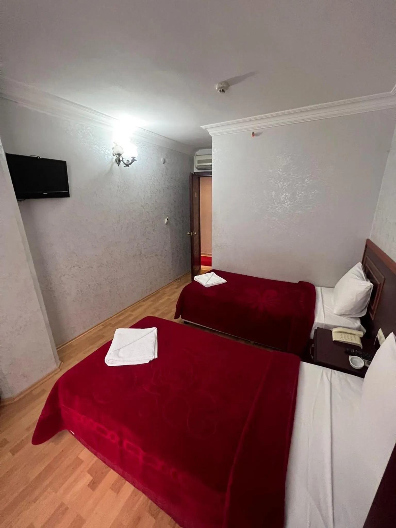 Bed in Red White Hotel