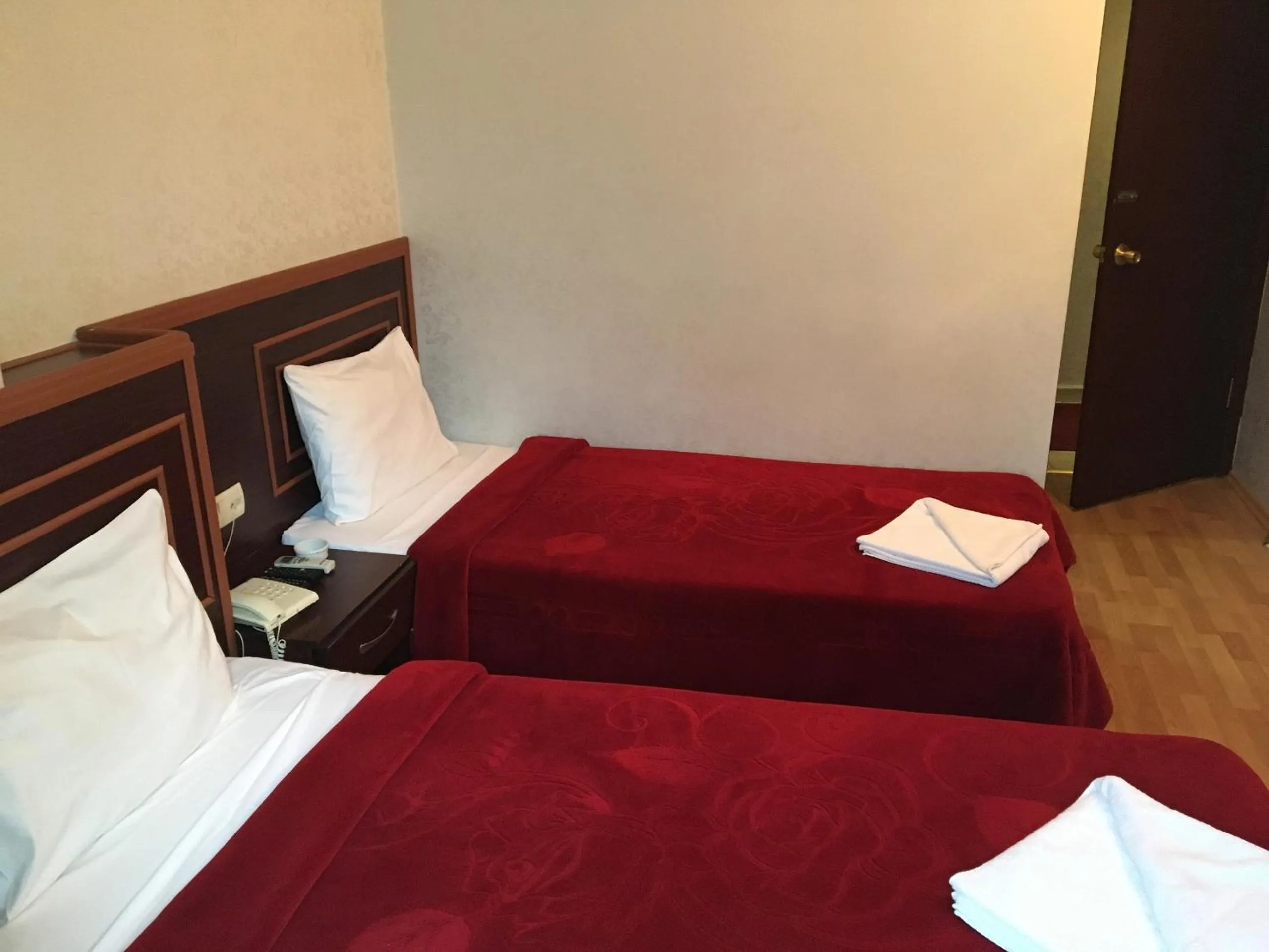 Bed in Red White Hotel
