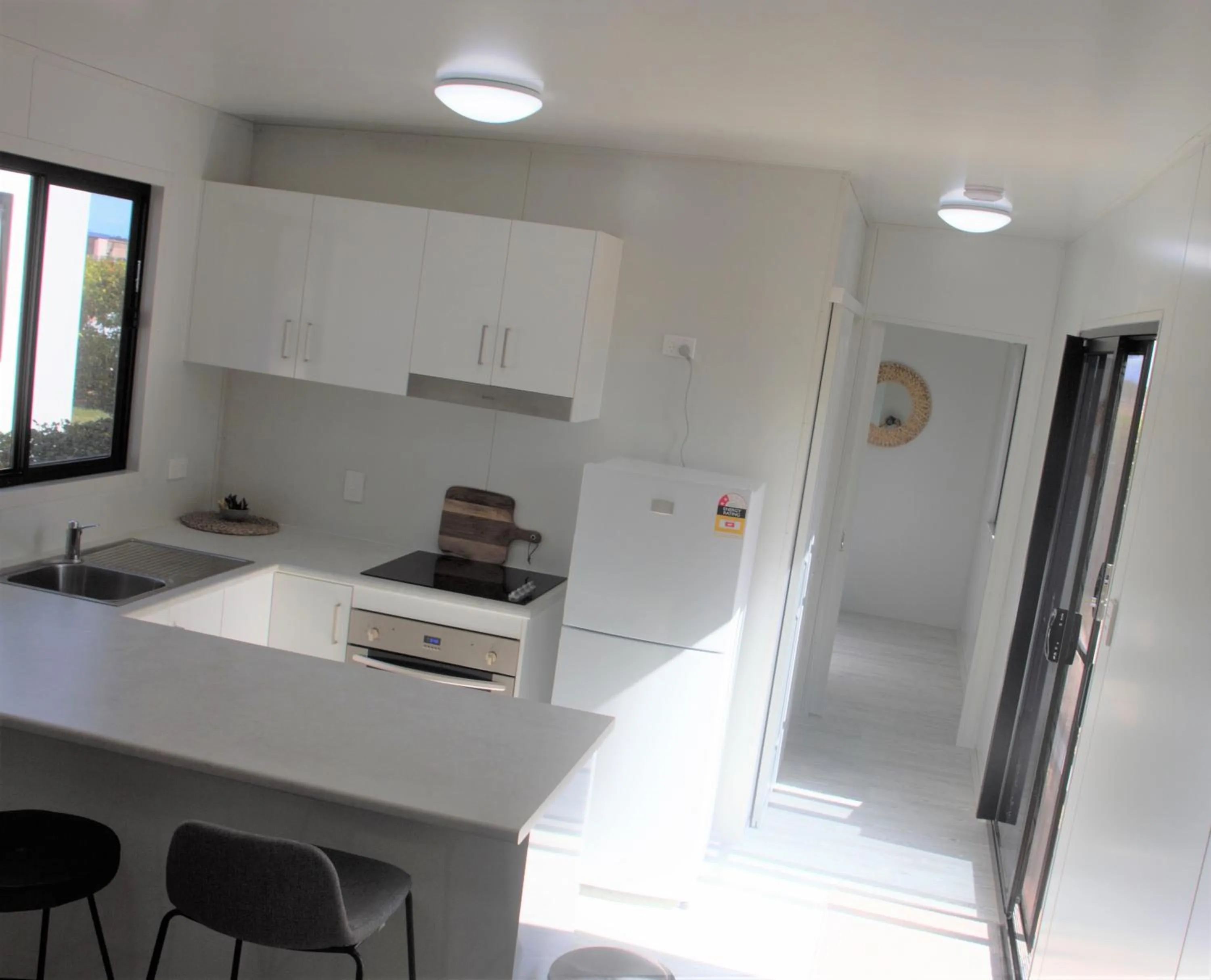 Kitchen or kitchenette in Alva Beach Tourist Park