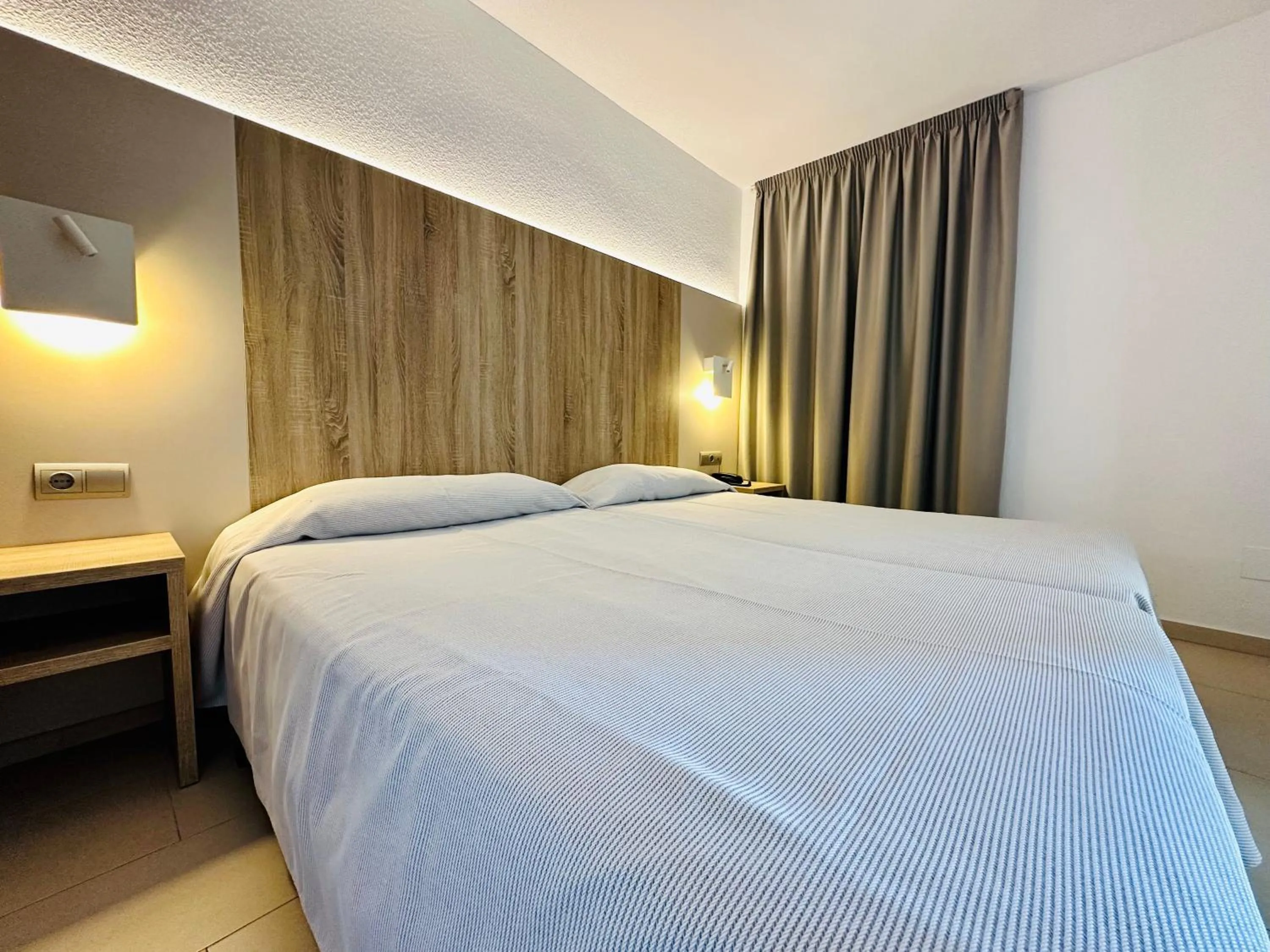 Bed in Apartamentos Jet - Adults Only