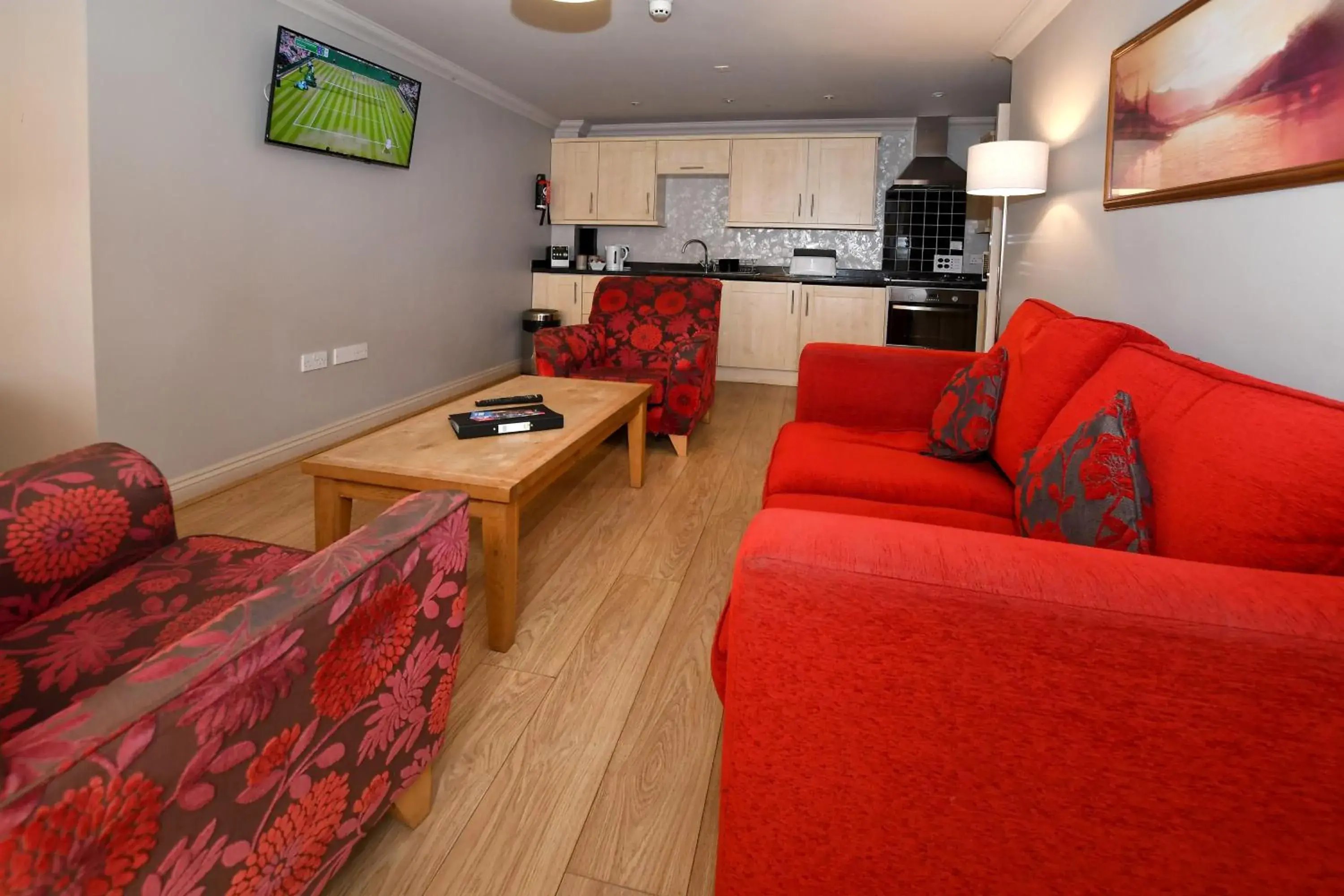 Living room in The Queens Hotel & Victoria Cloisters Apartments Living room in The Queens Hotel & Victoria Cloisters Apartments