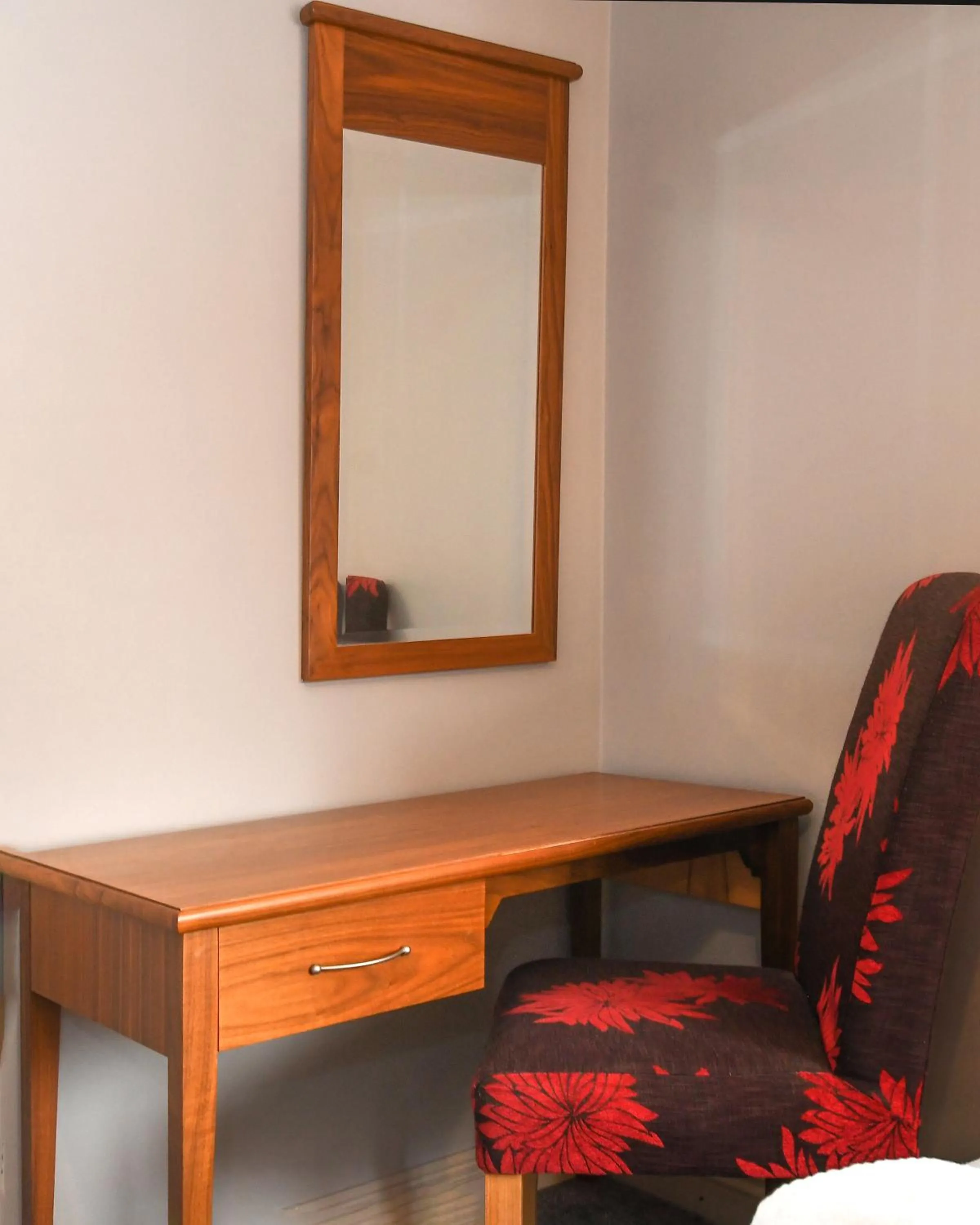 Bedroom in The Queens Hotel & Victoria Cloisters Apartments