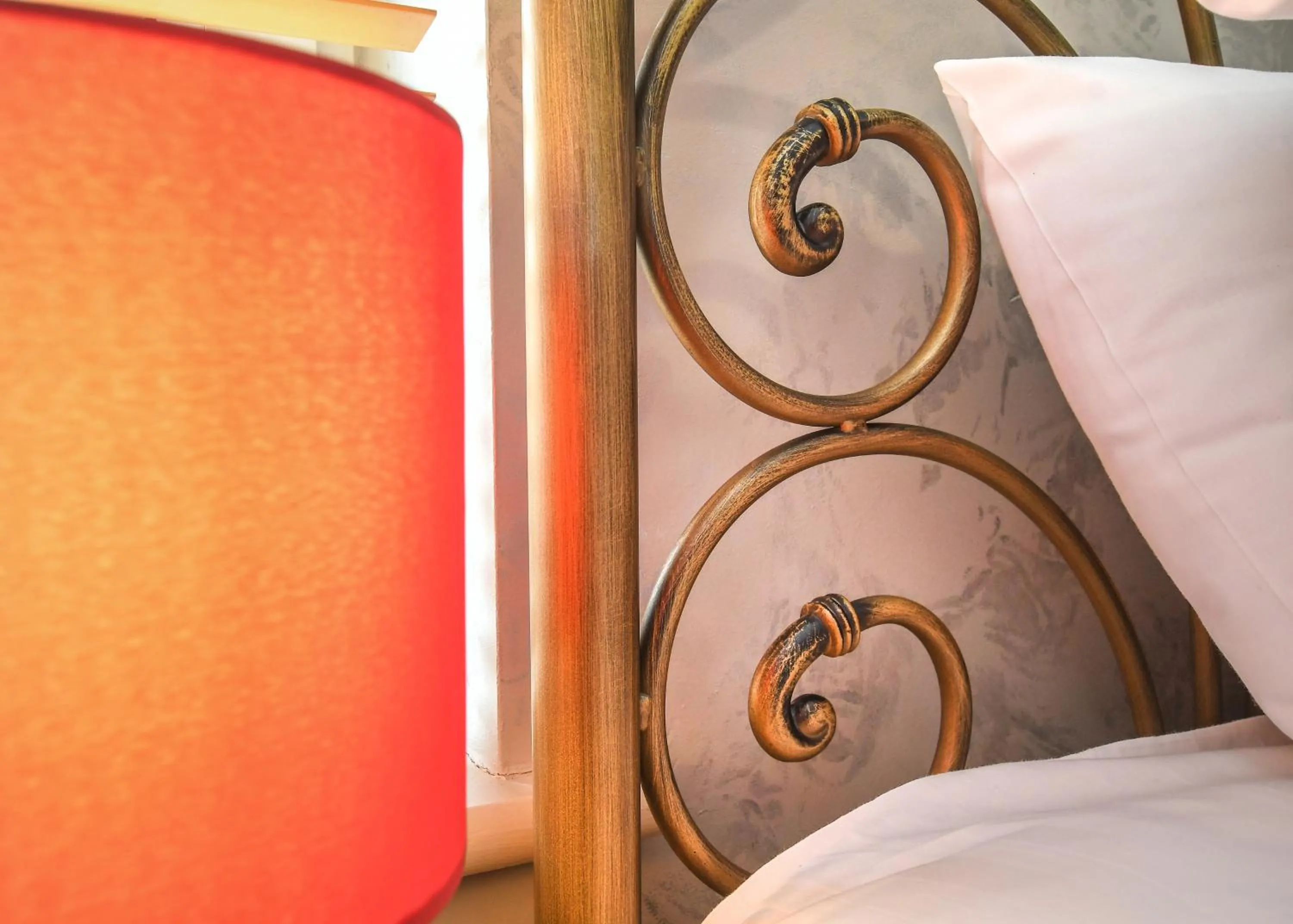 Decorative detail, Bed in The Queens Hotel & Victoria Cloisters Apartments