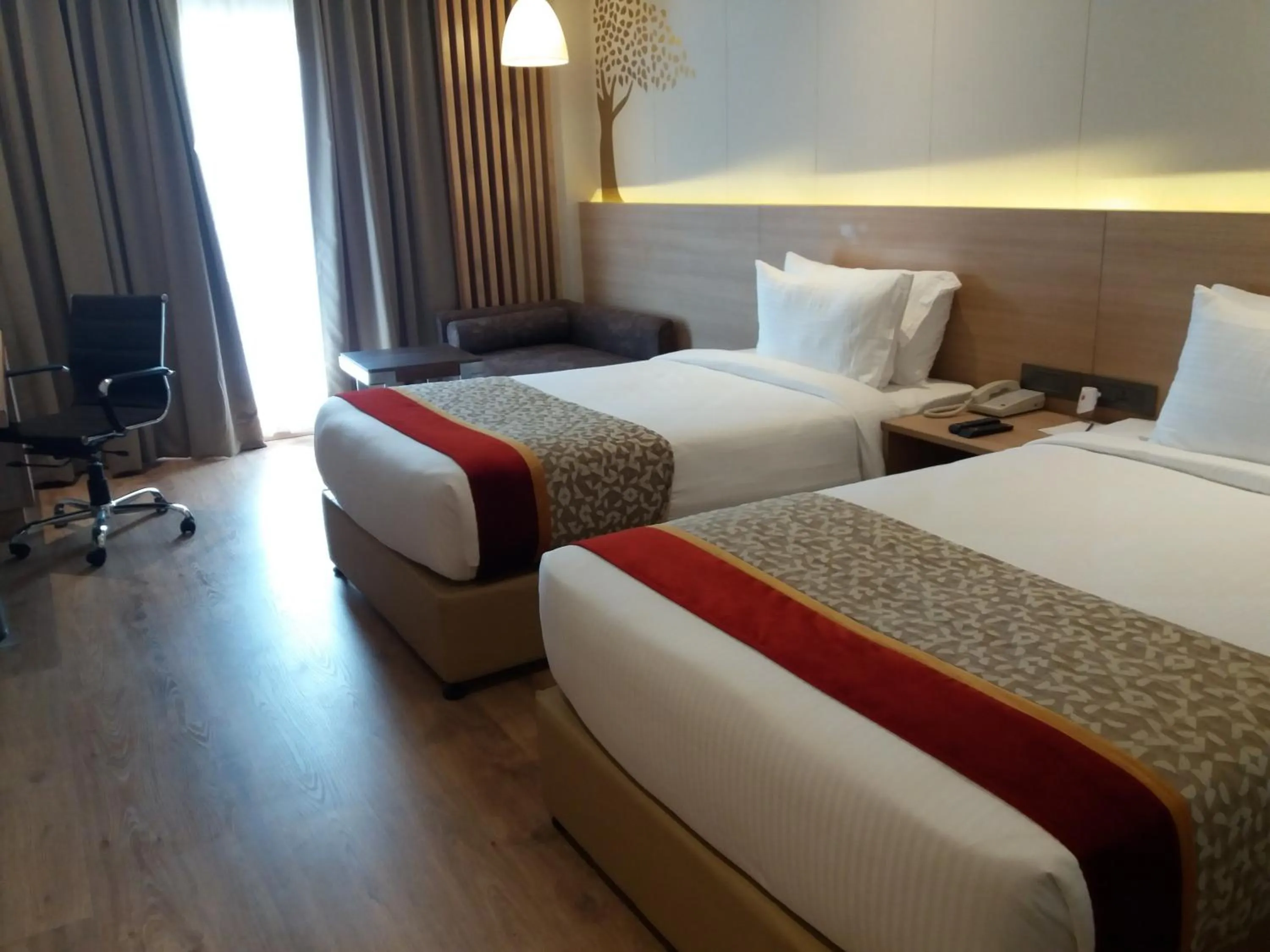 Bedroom in Oaks Bodhgaya