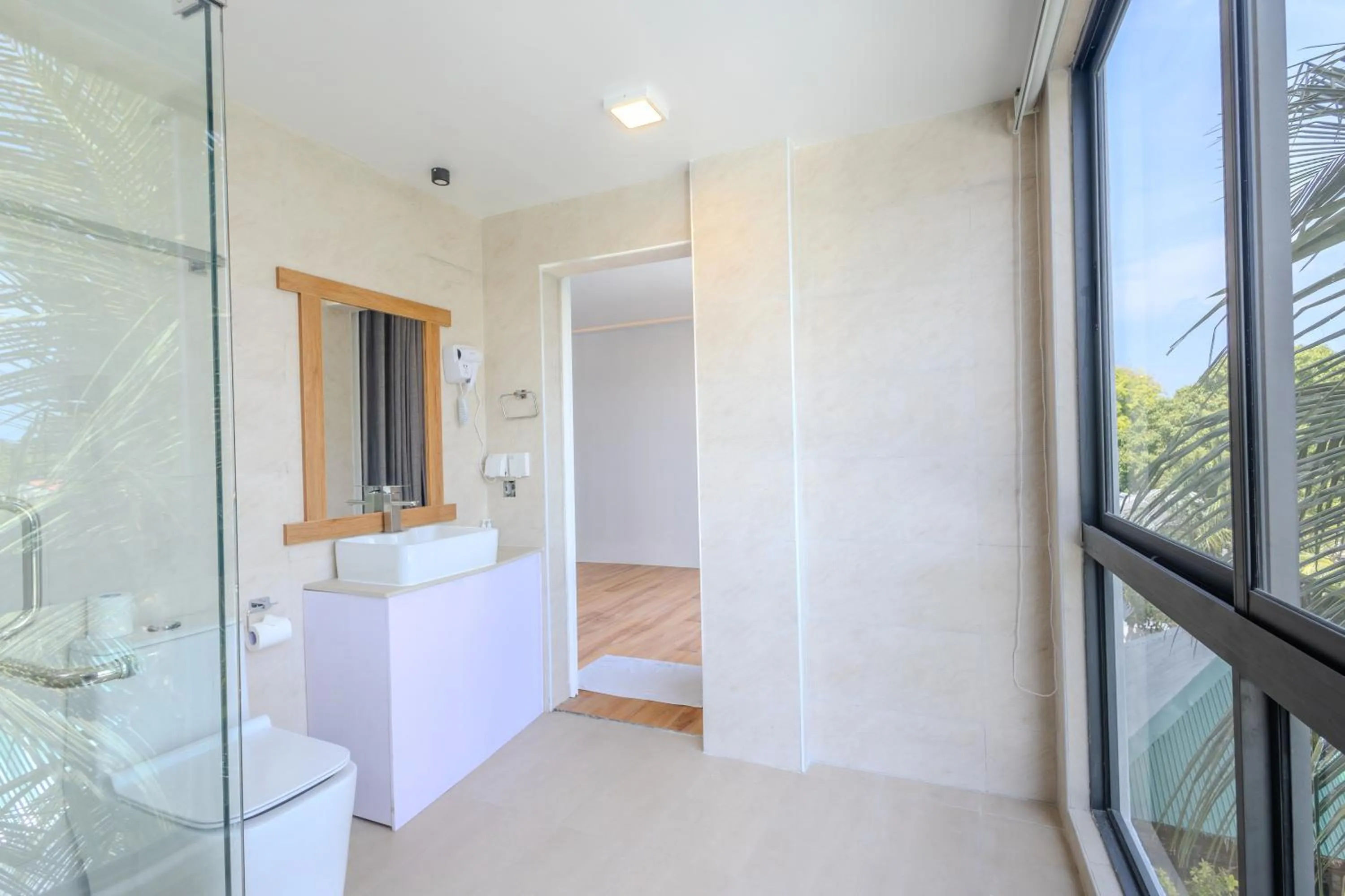 Shower in Shallow Lagoon Rasdhoo