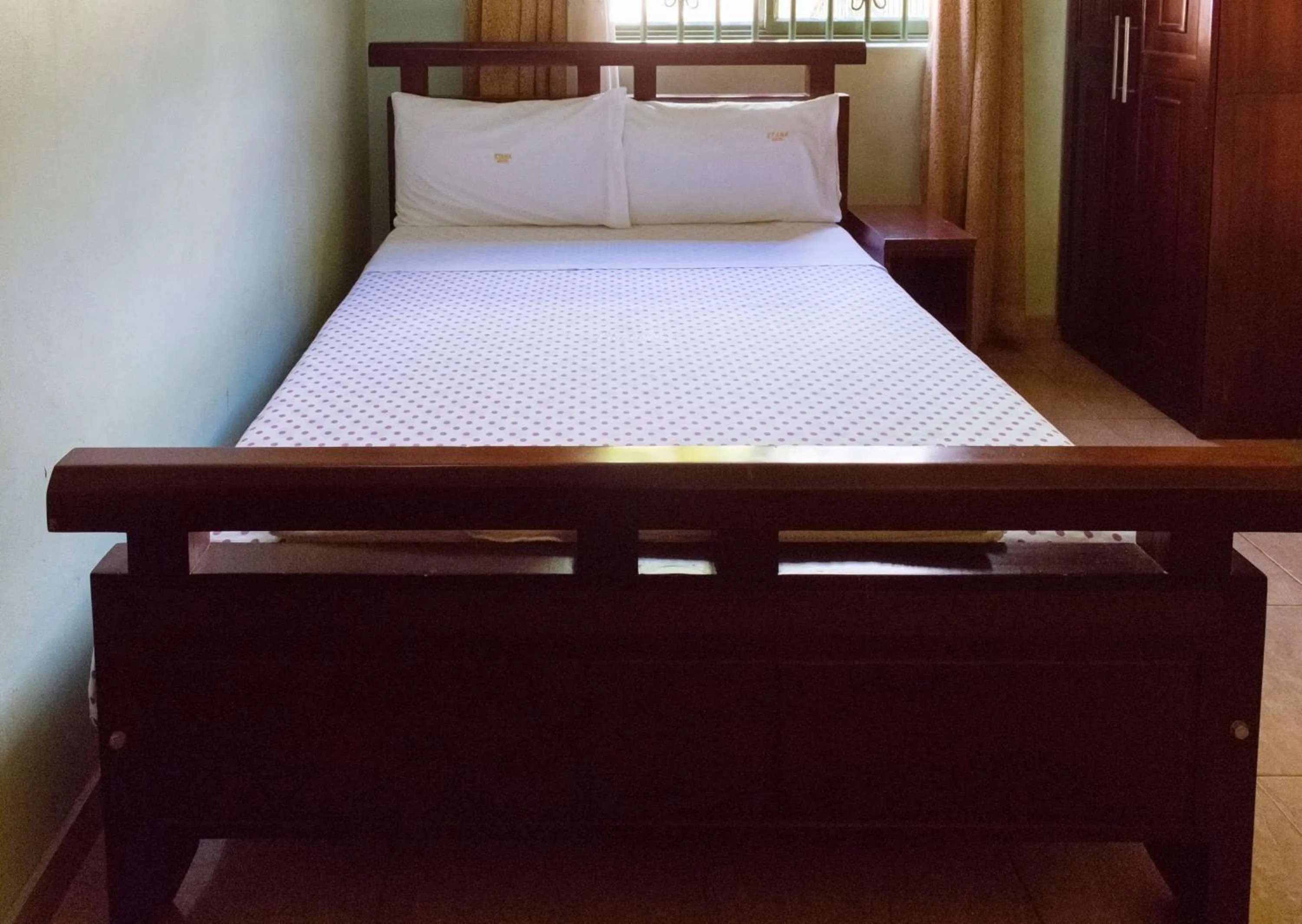 Bed in Etana Motel Kampala
