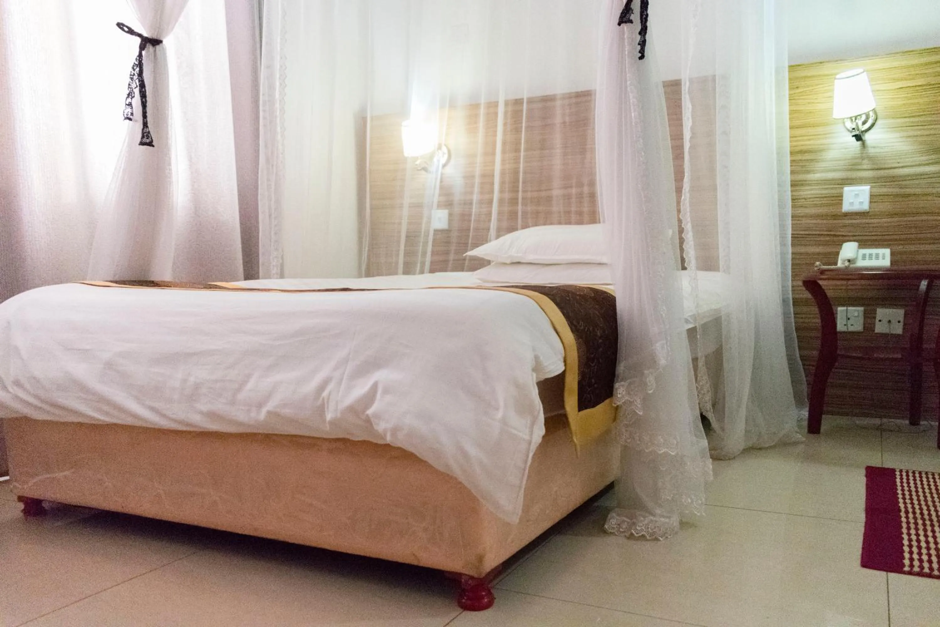 Bed in Remmings Hotel Kampala