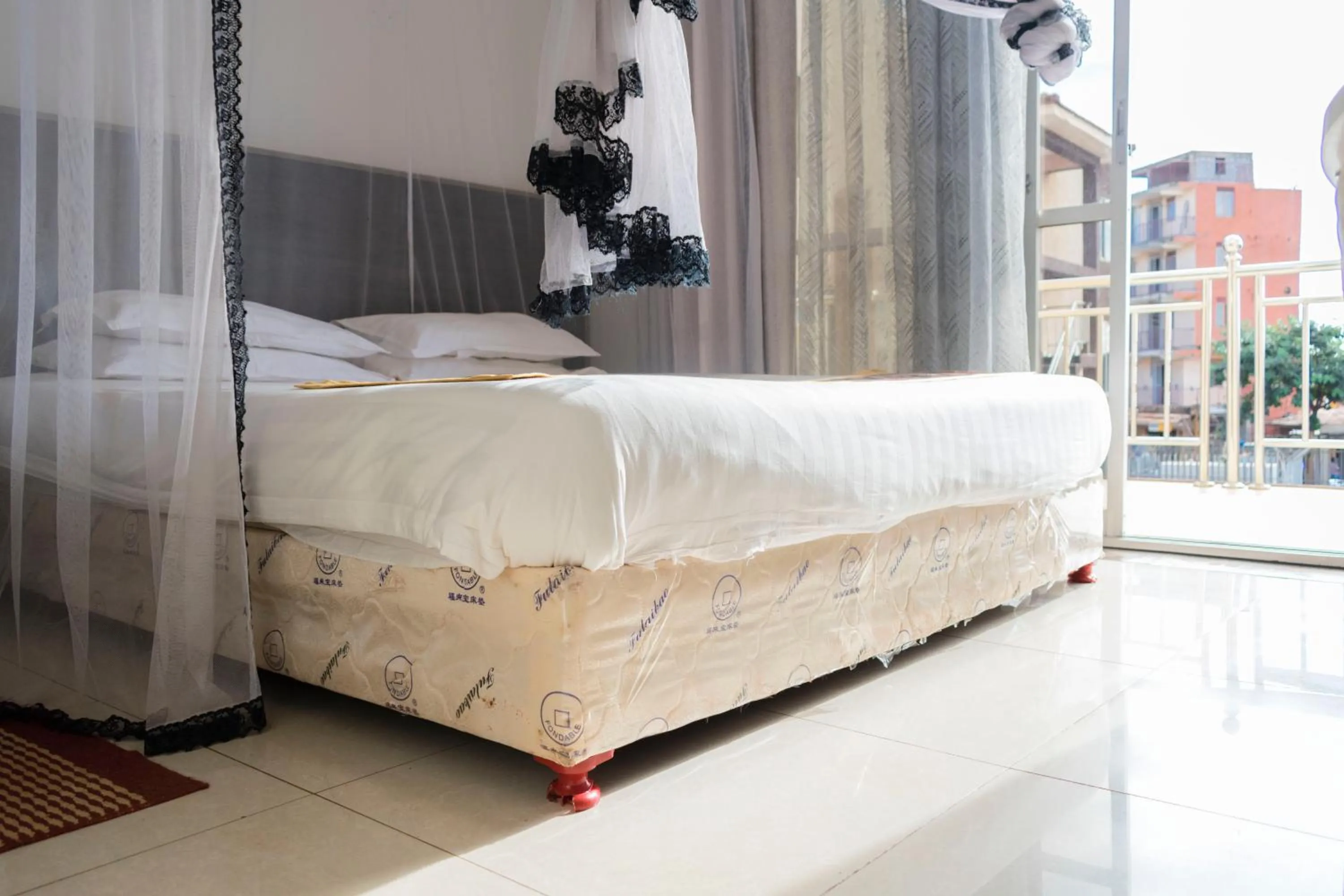 Bed in Remmings Hotel Kampala