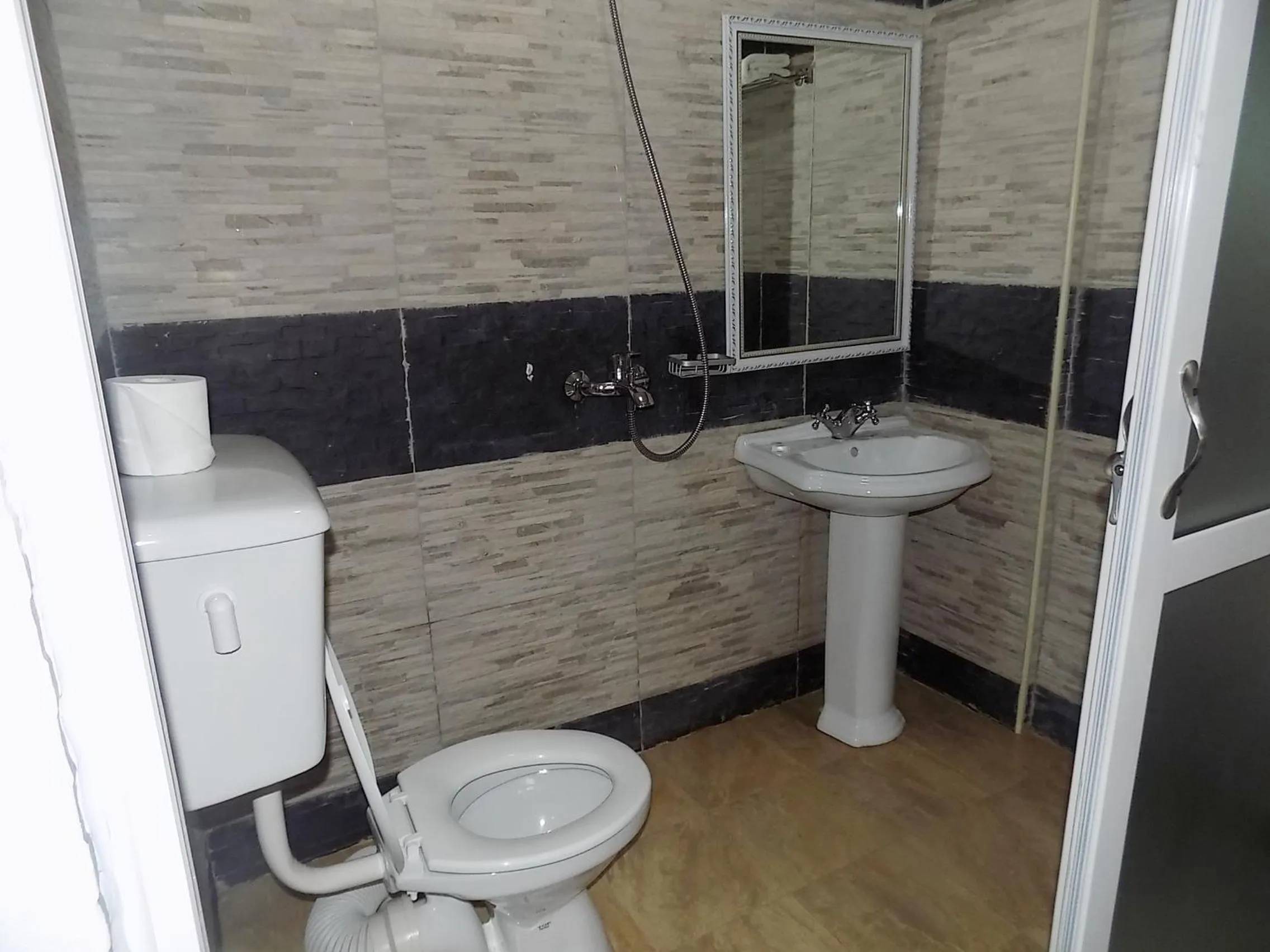 Bathroom in Remmings Hotel Kampala