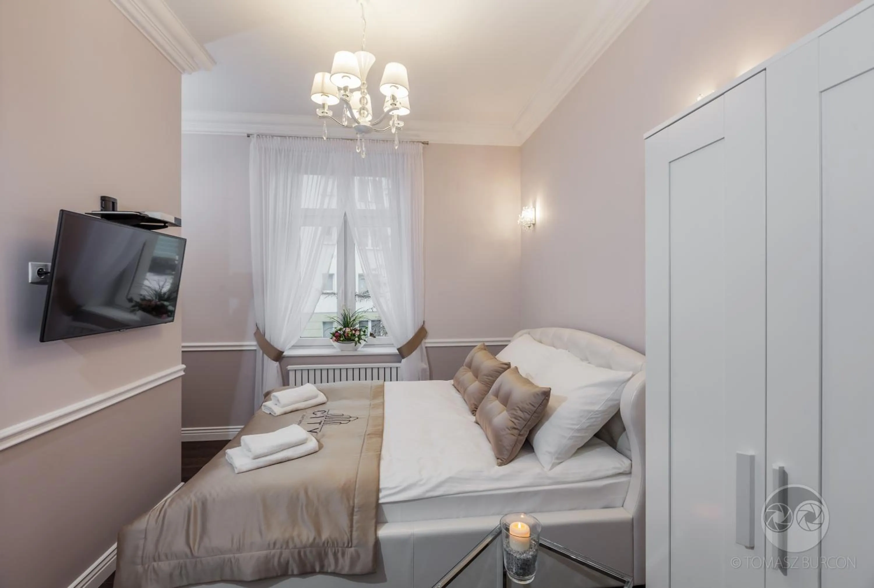 TV and multimedia, Bed in Apartamenty City.