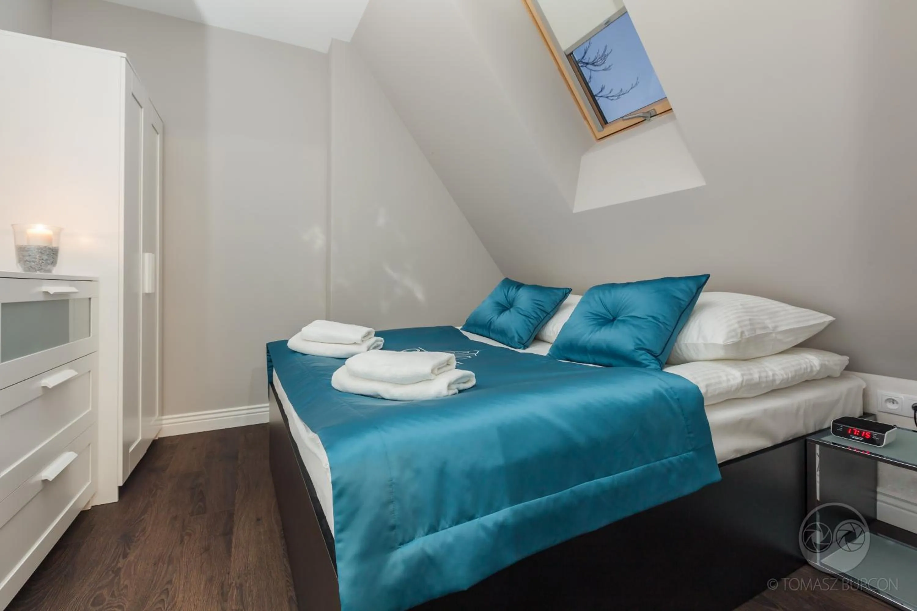 Seating area, Bed in Apartamenty City.