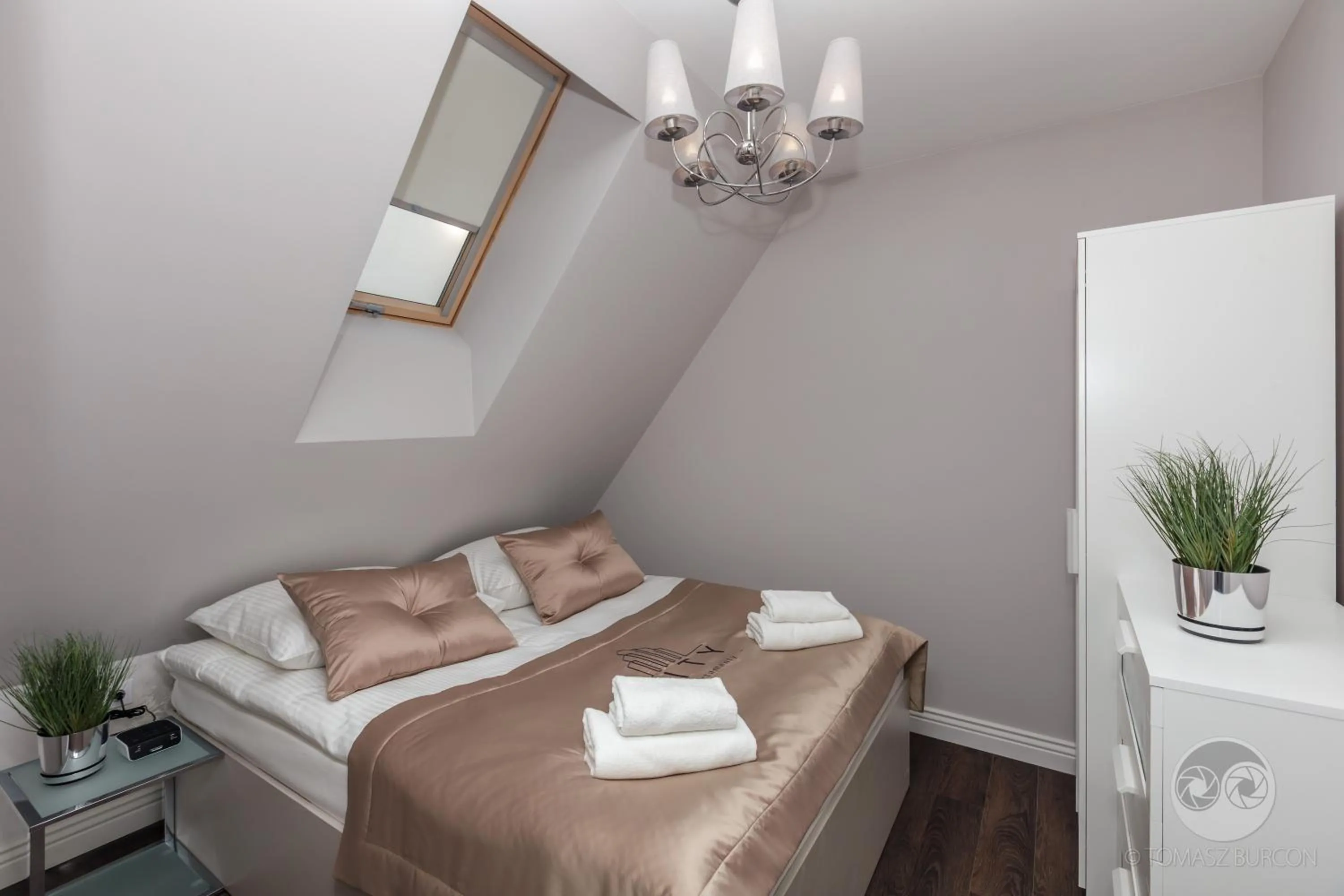 Seating area, Bed in Apartamenty City.