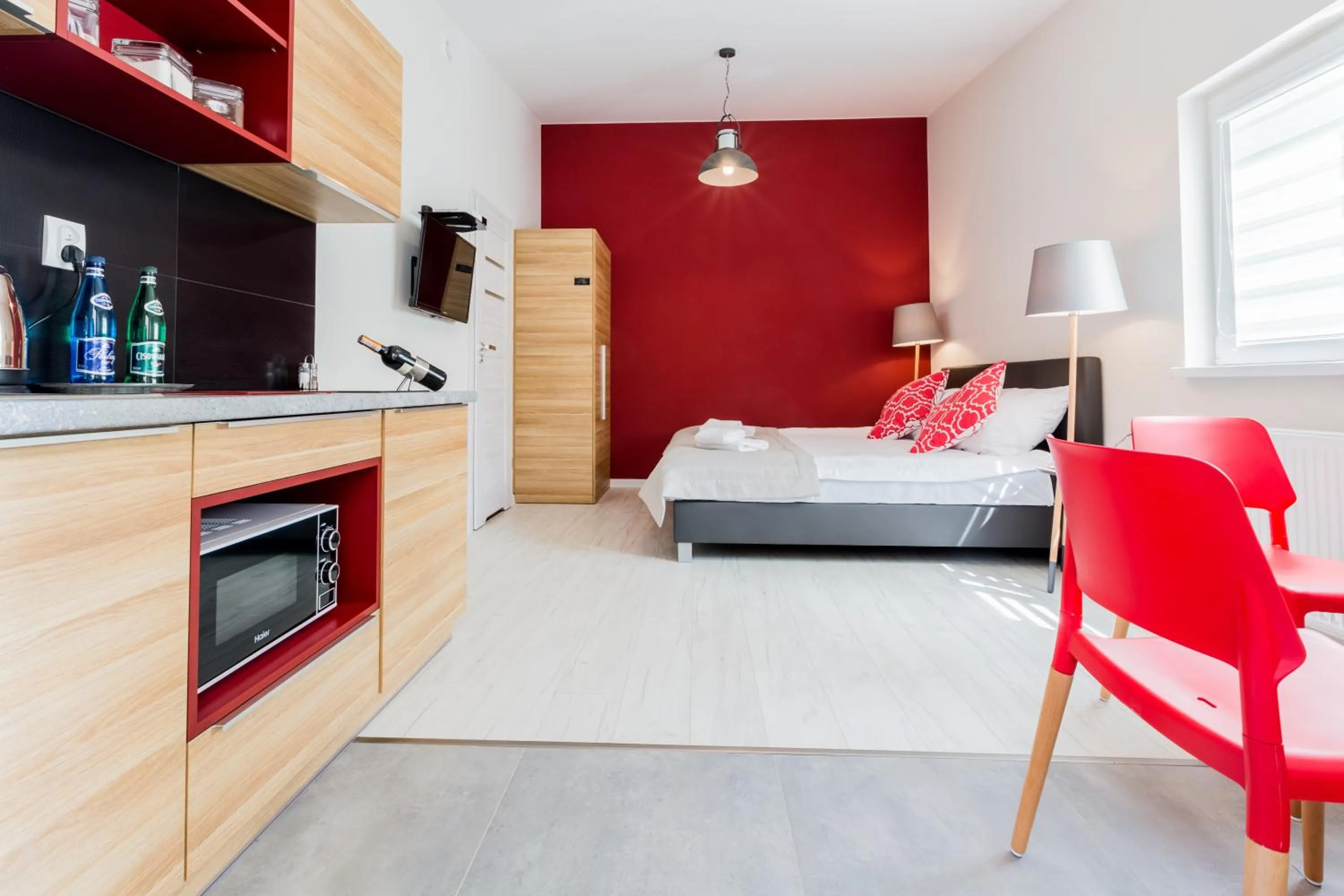 TV and multimedia, Bed in Apartamenty City.