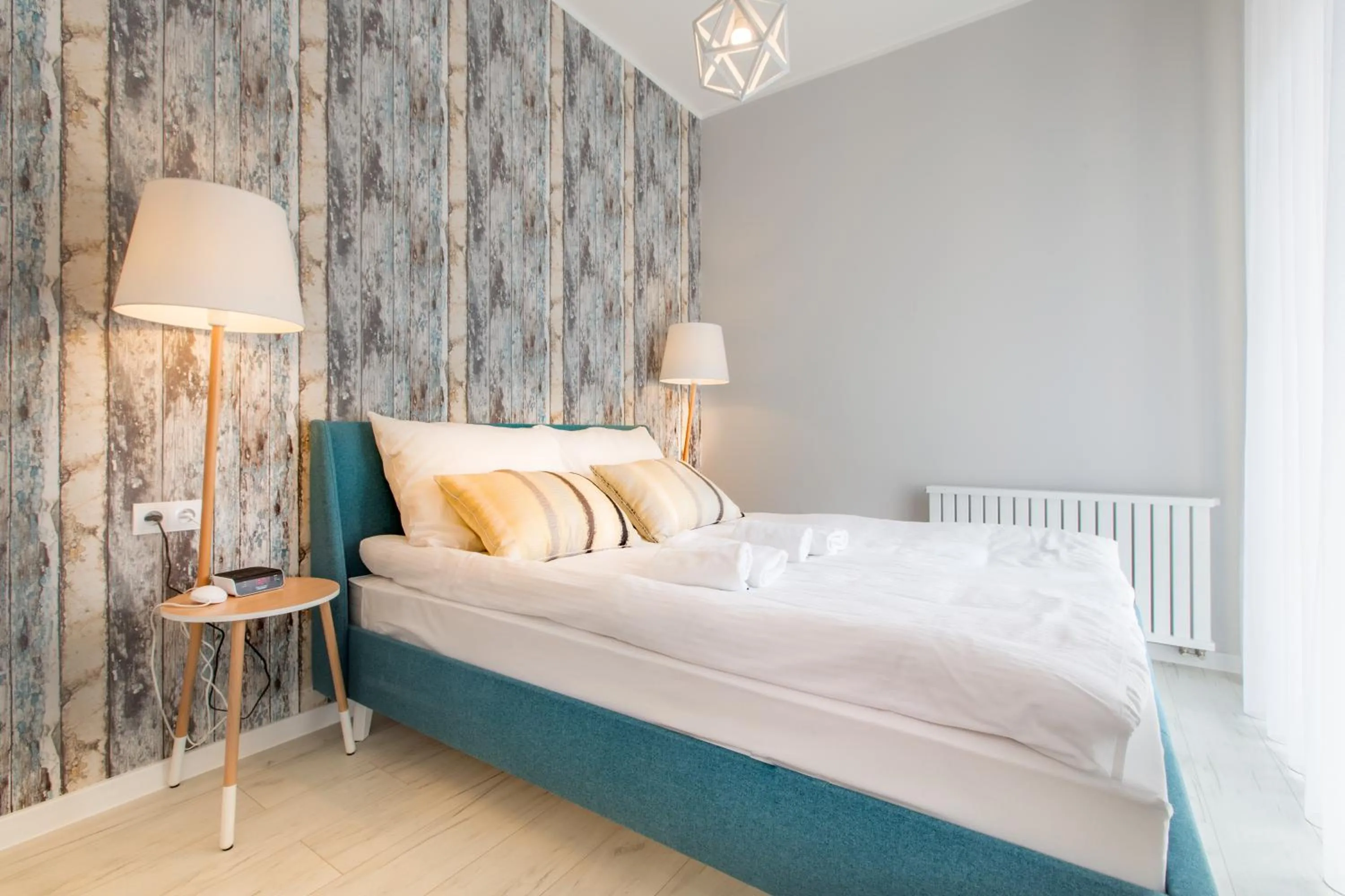 Seating area, Bed in Apartamenty City.