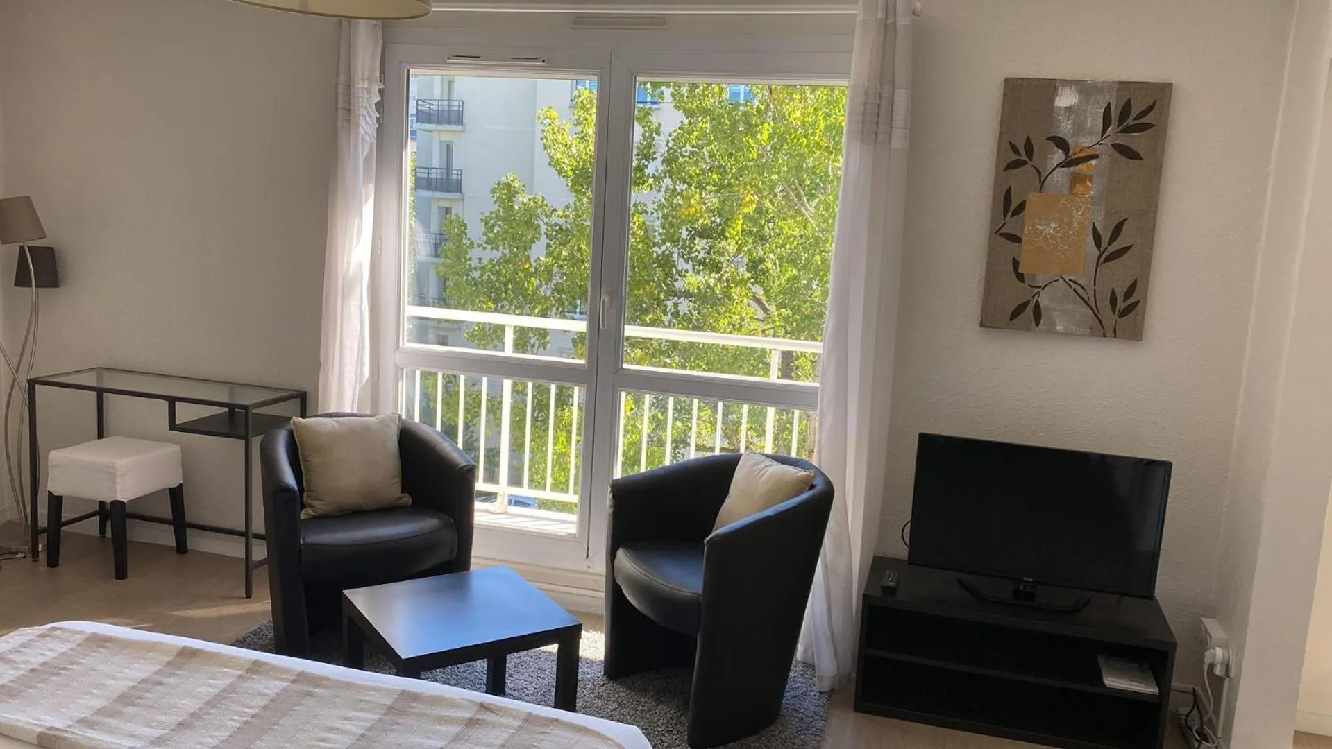 Bedroom in Appart' Hôtel Fauriel Saint-Etienne Parking privé balcon wifi