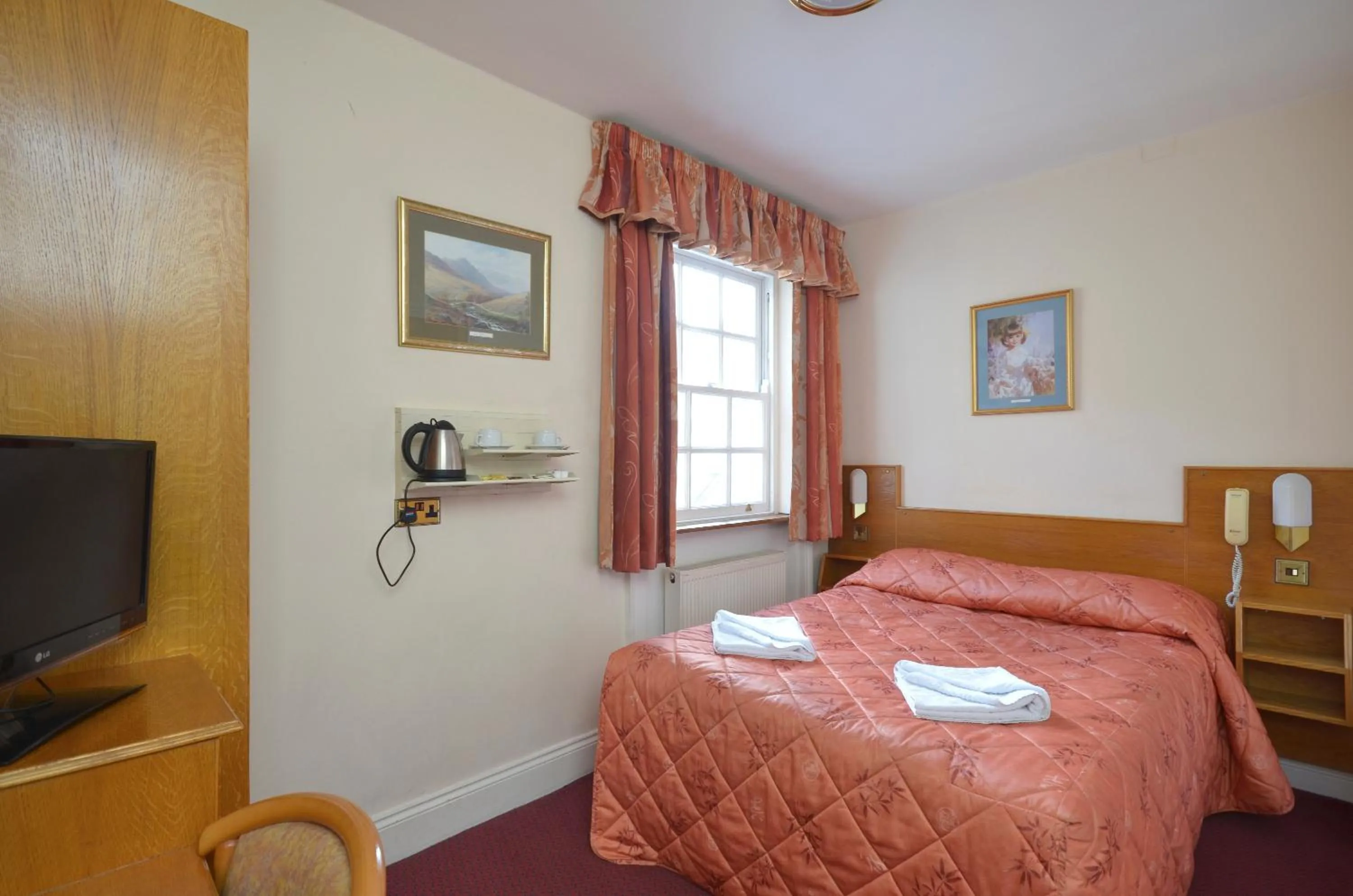 Bed in Seymour Hotel