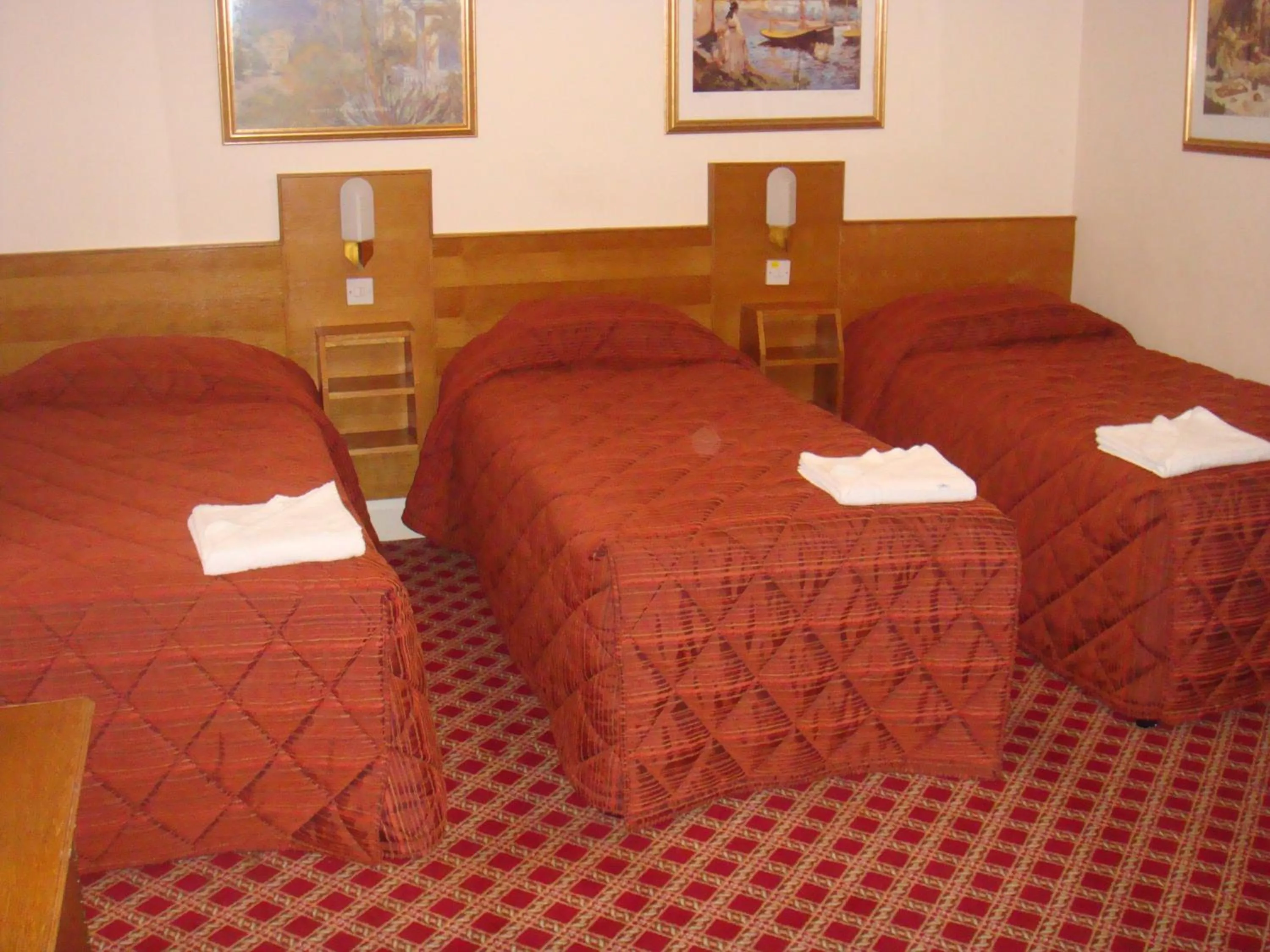 Bed in Seymour Hotel