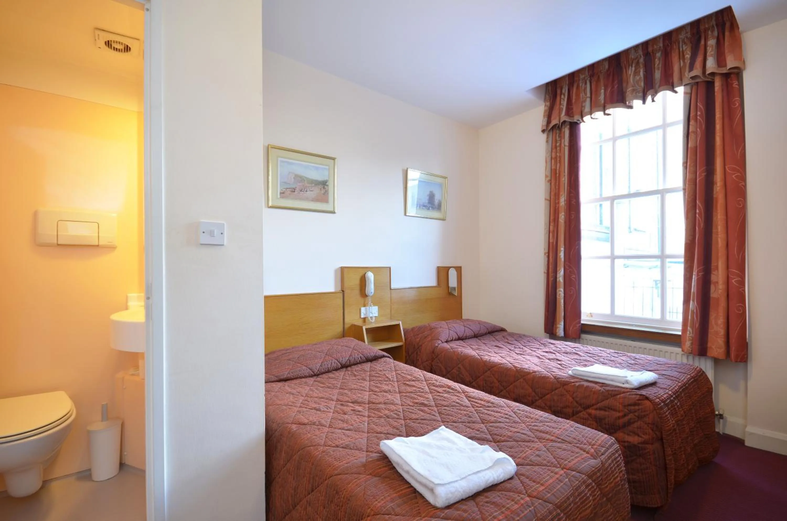 Bed in Seymour Hotel