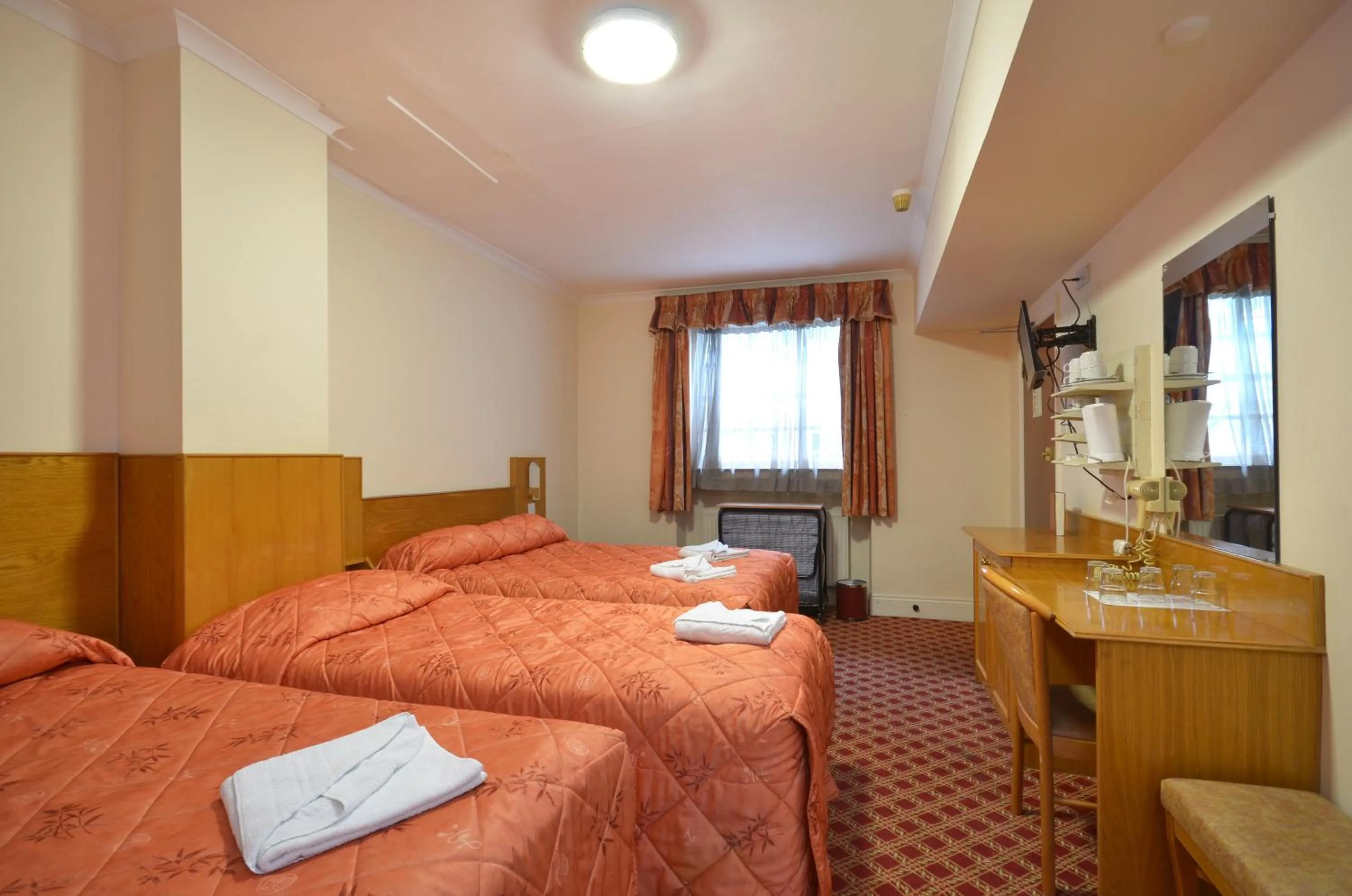 Bed in Seymour Hotel