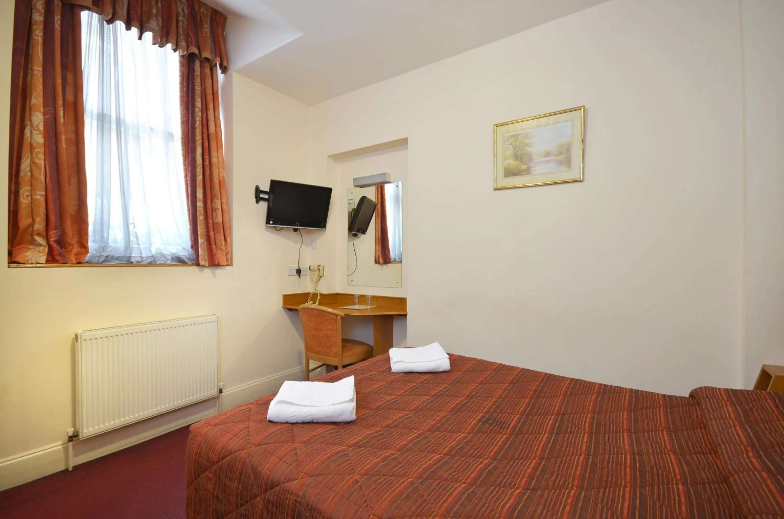 Bed in Seymour Hotel