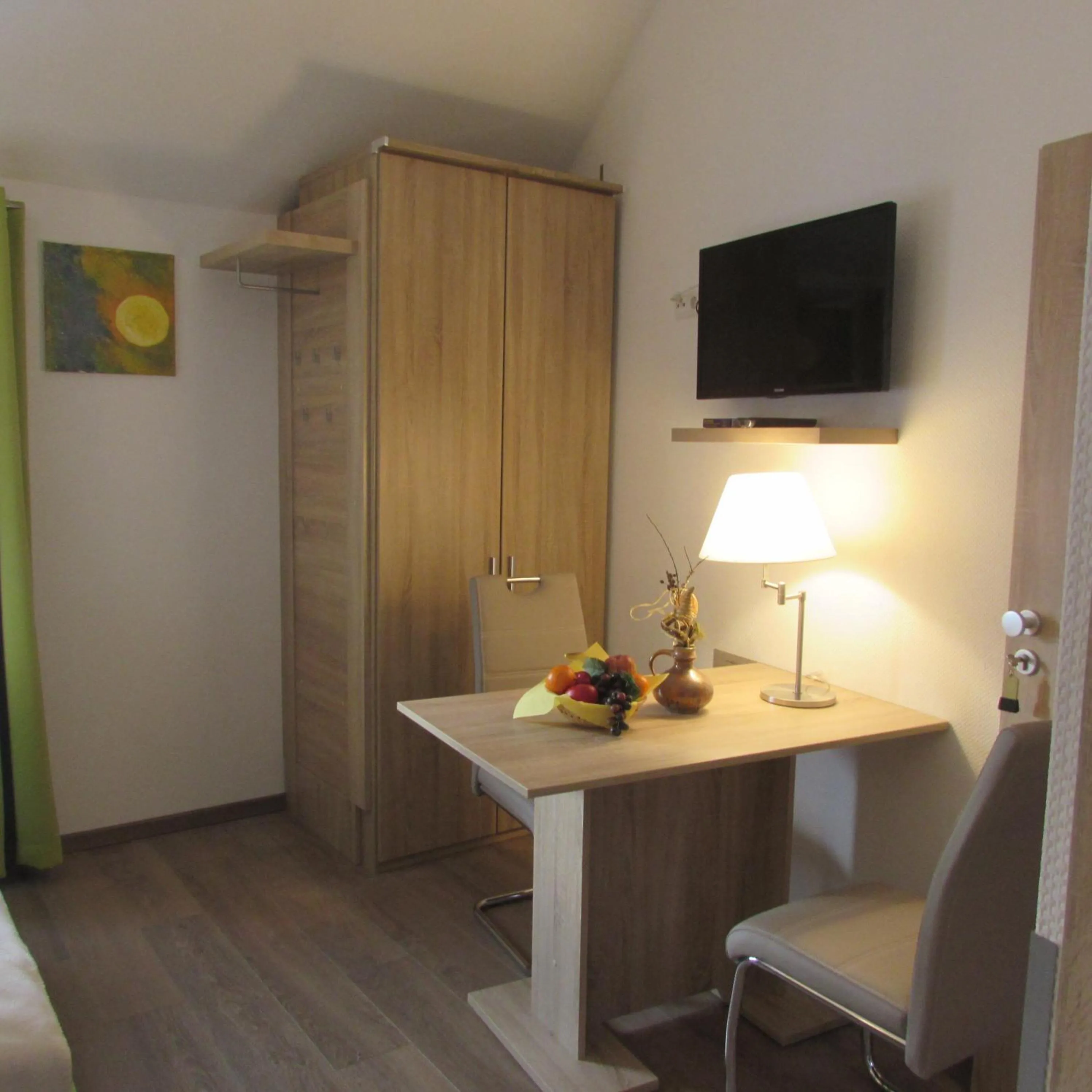 Communal lounge/ TV room in Eifel Quartier Pension und Gasthof "Em Gardestüffje"
