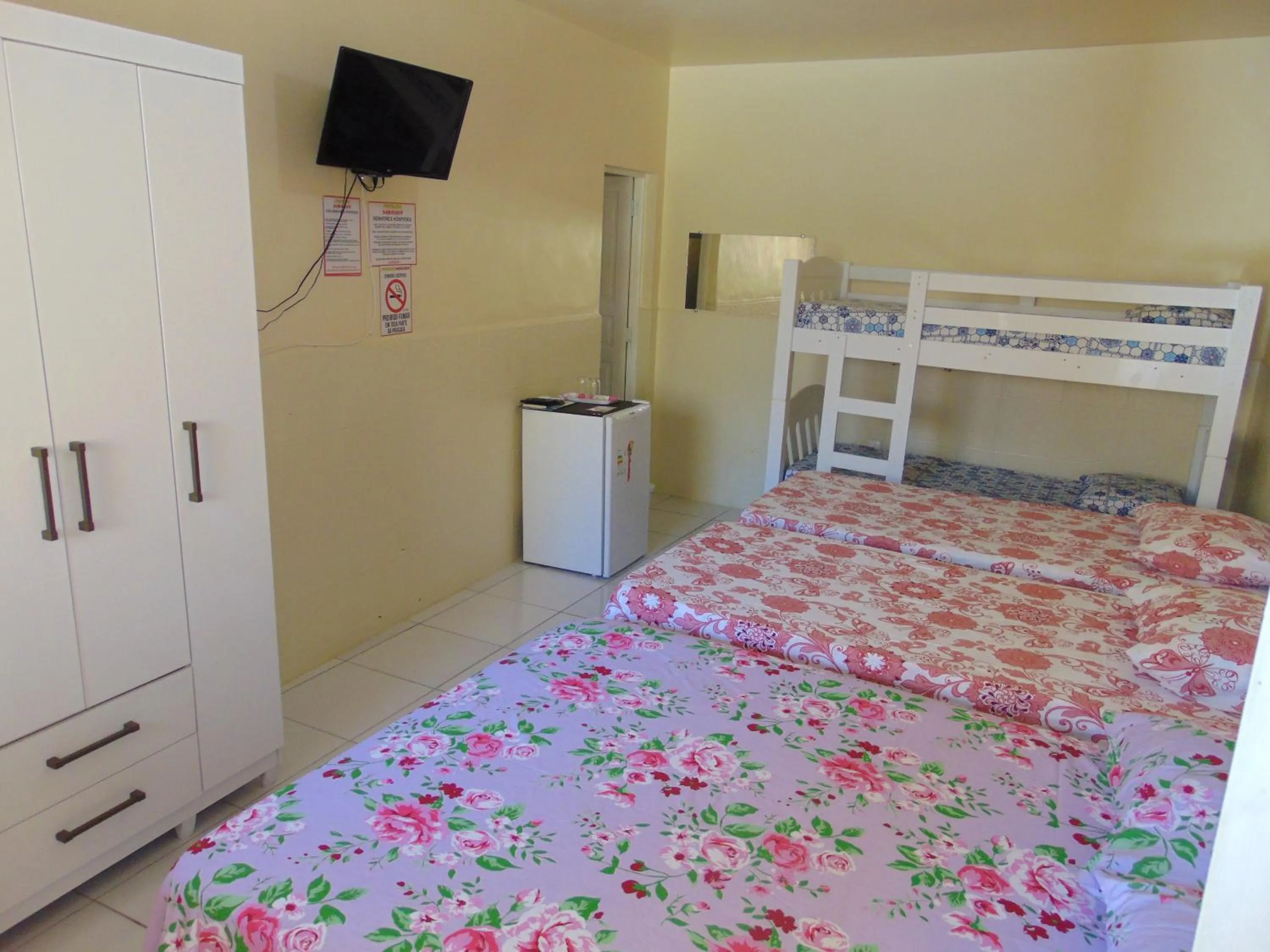 Bed in Pousada Sabrinna