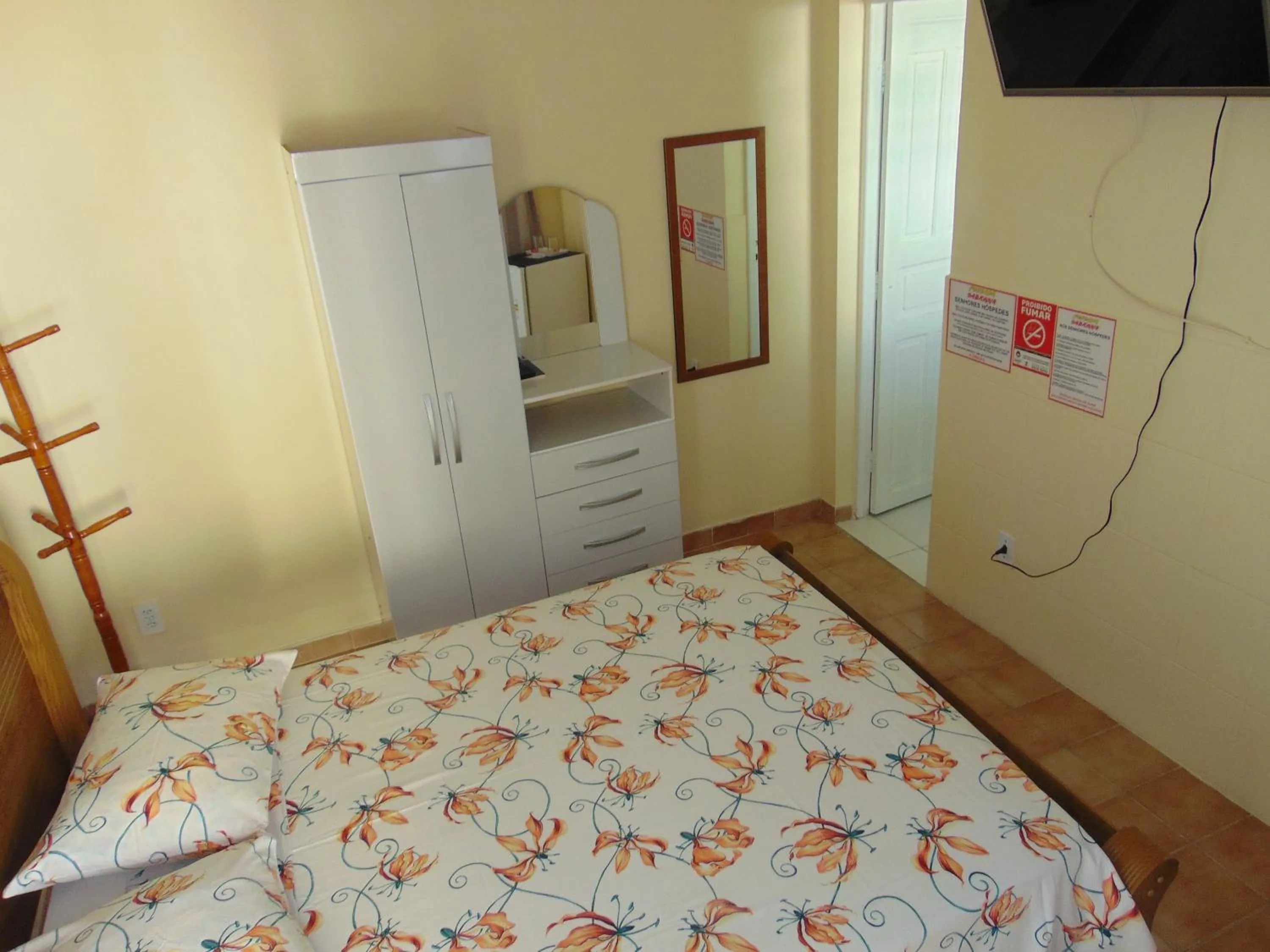 Bed in Pousada Sabrinna