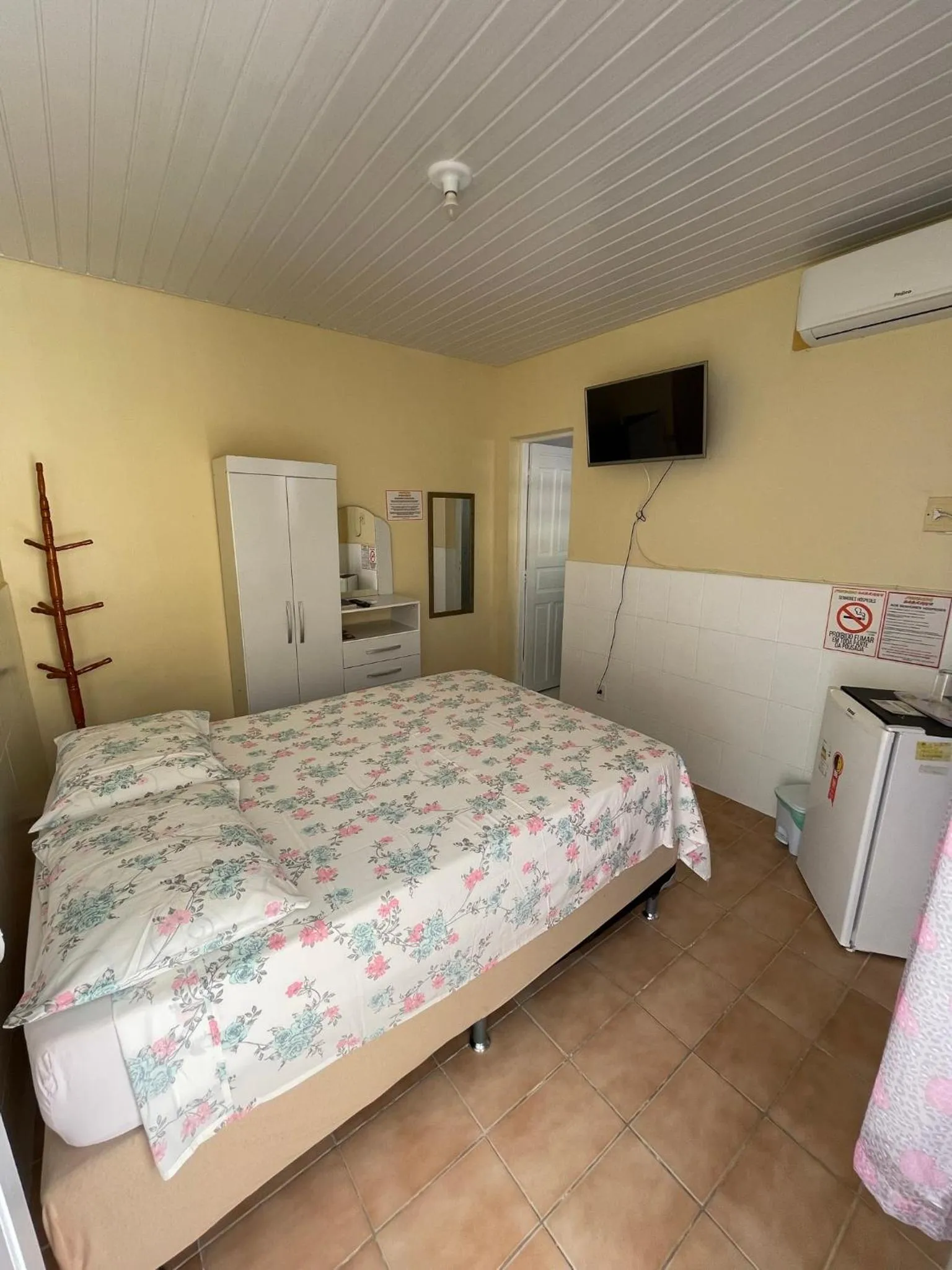 Bed in Pousada Sabrinna