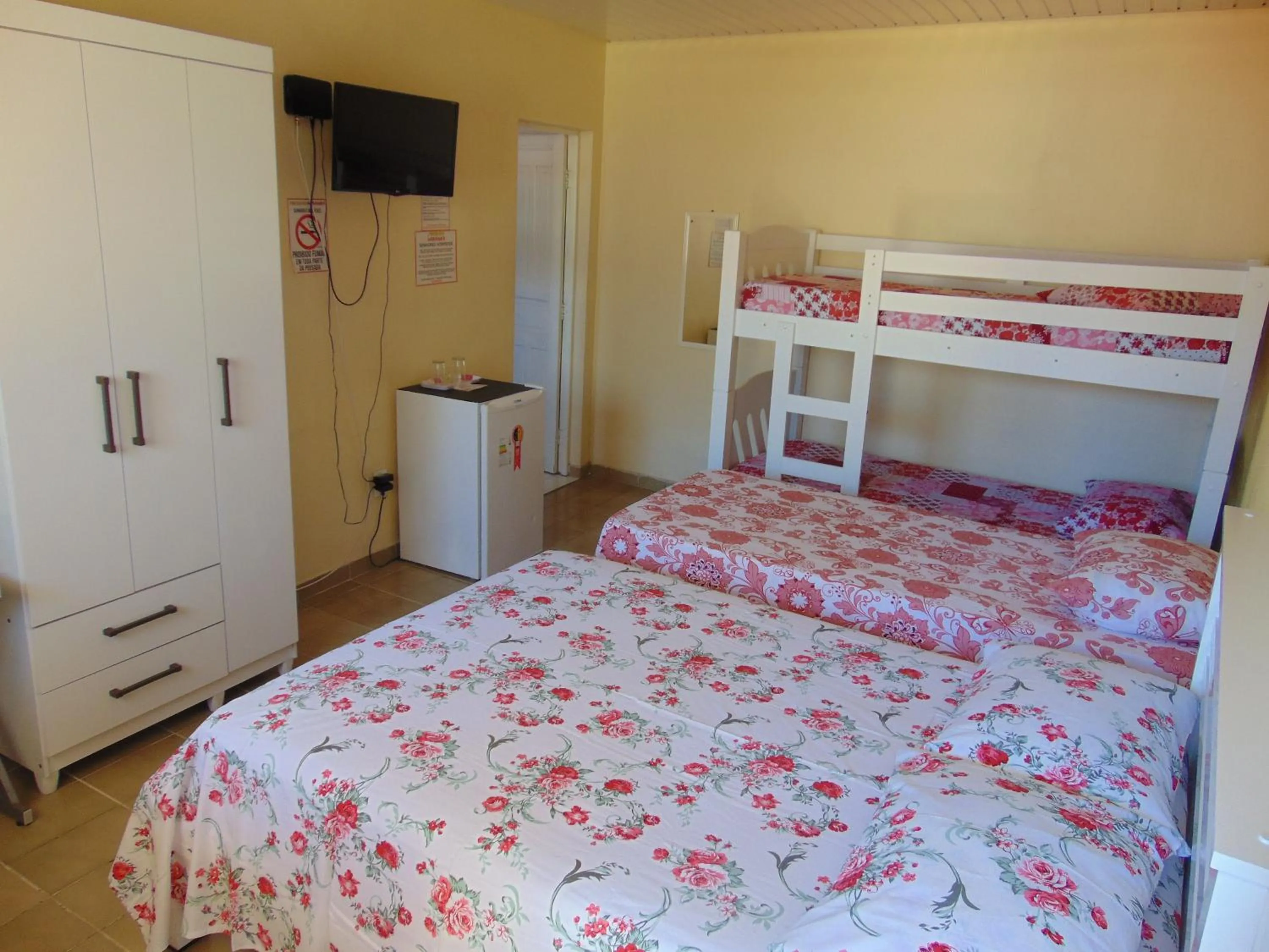 Bed in Pousada Sabrinna