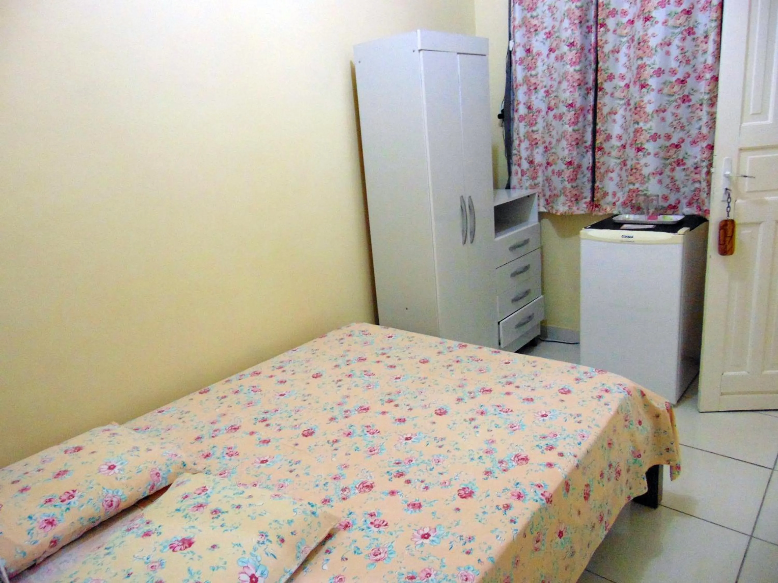 Bed in Pousada Sabrinna