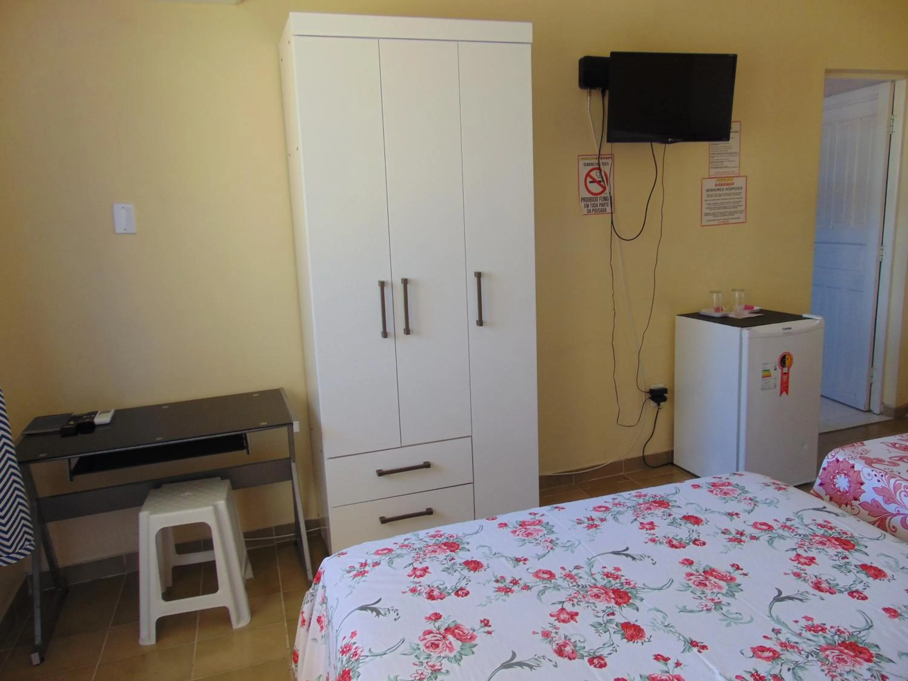 Bed in Pousada Sabrinna