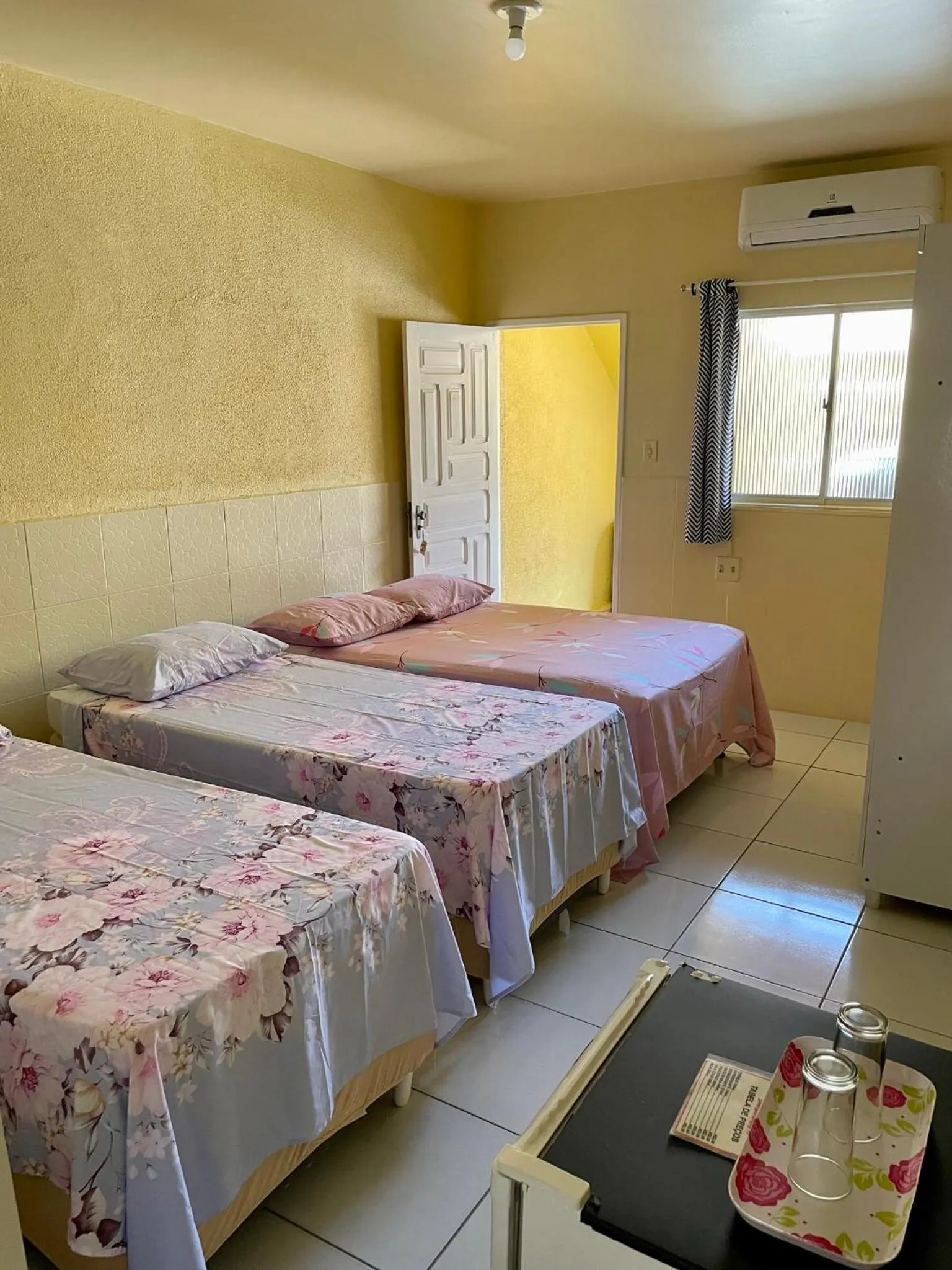 Bed in Pousada Sabrinna