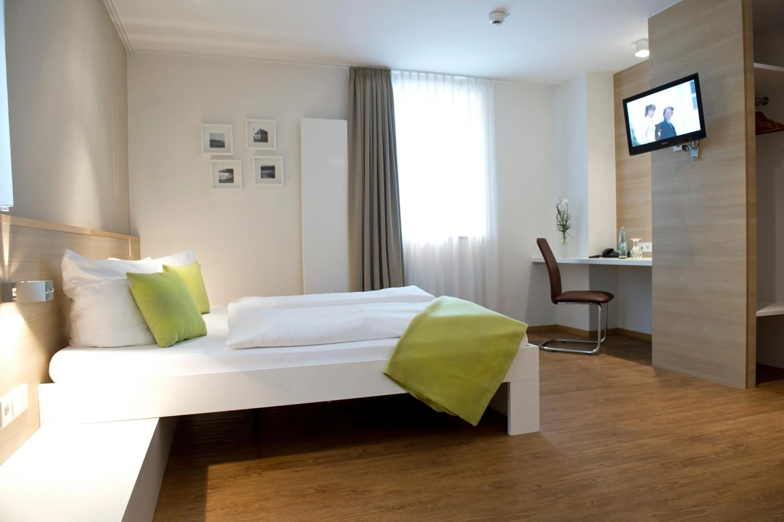 Photo of the whole room, Bed in Volkspark Hotel