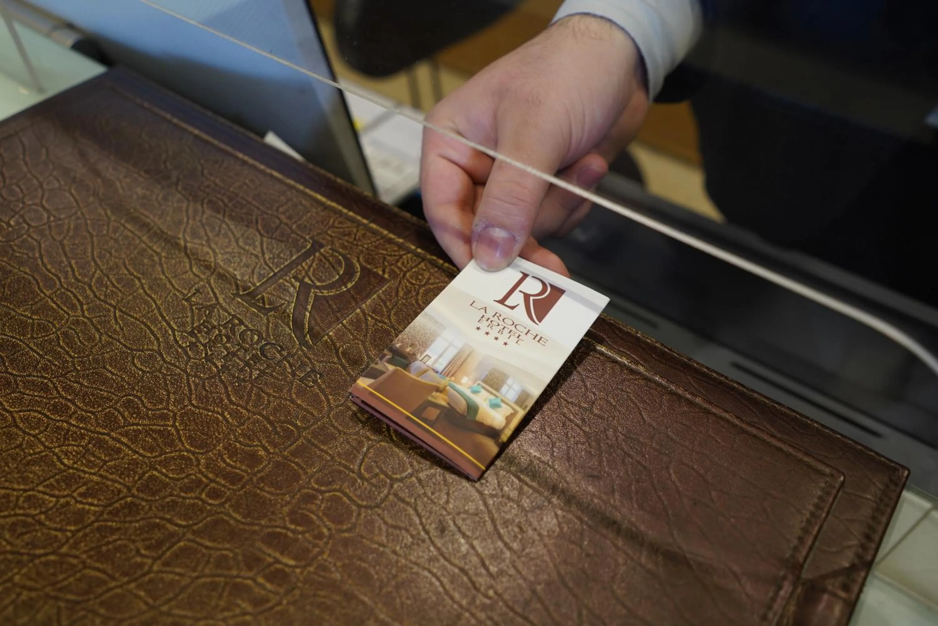 Lobby or reception in La Roche Hotel