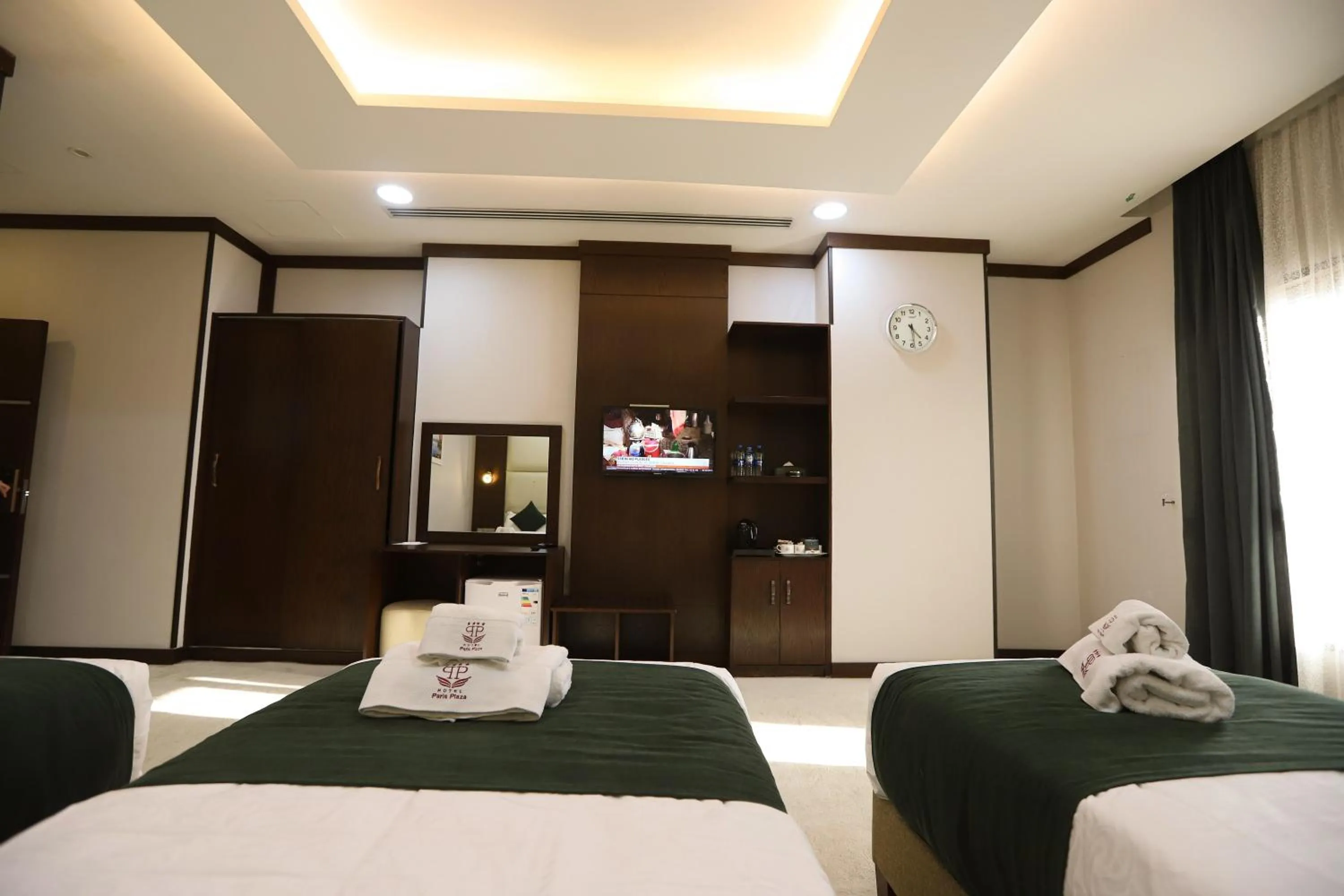 Bed in Paris Plaza Hotel