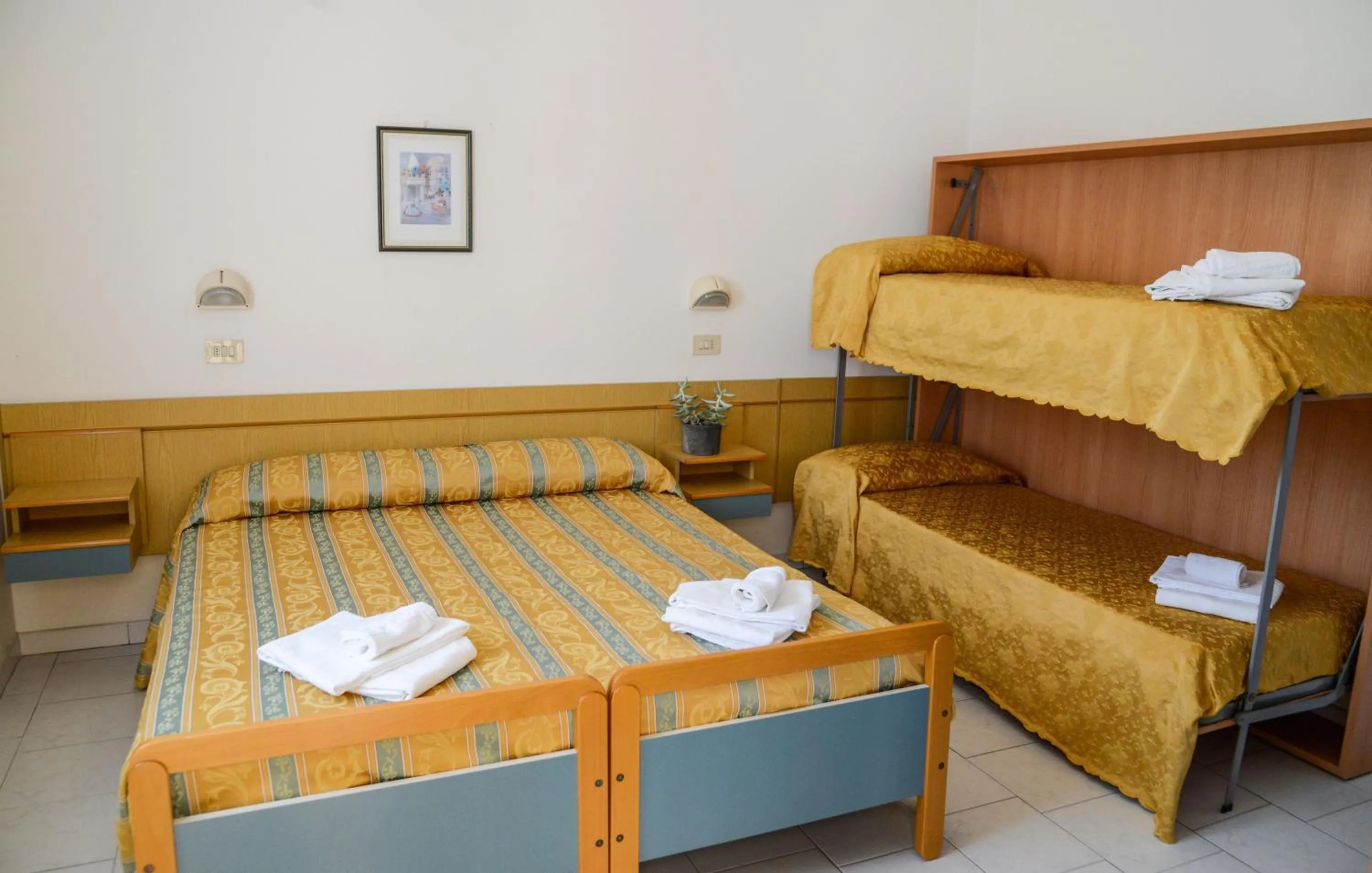 Bed in Hotel Riziana