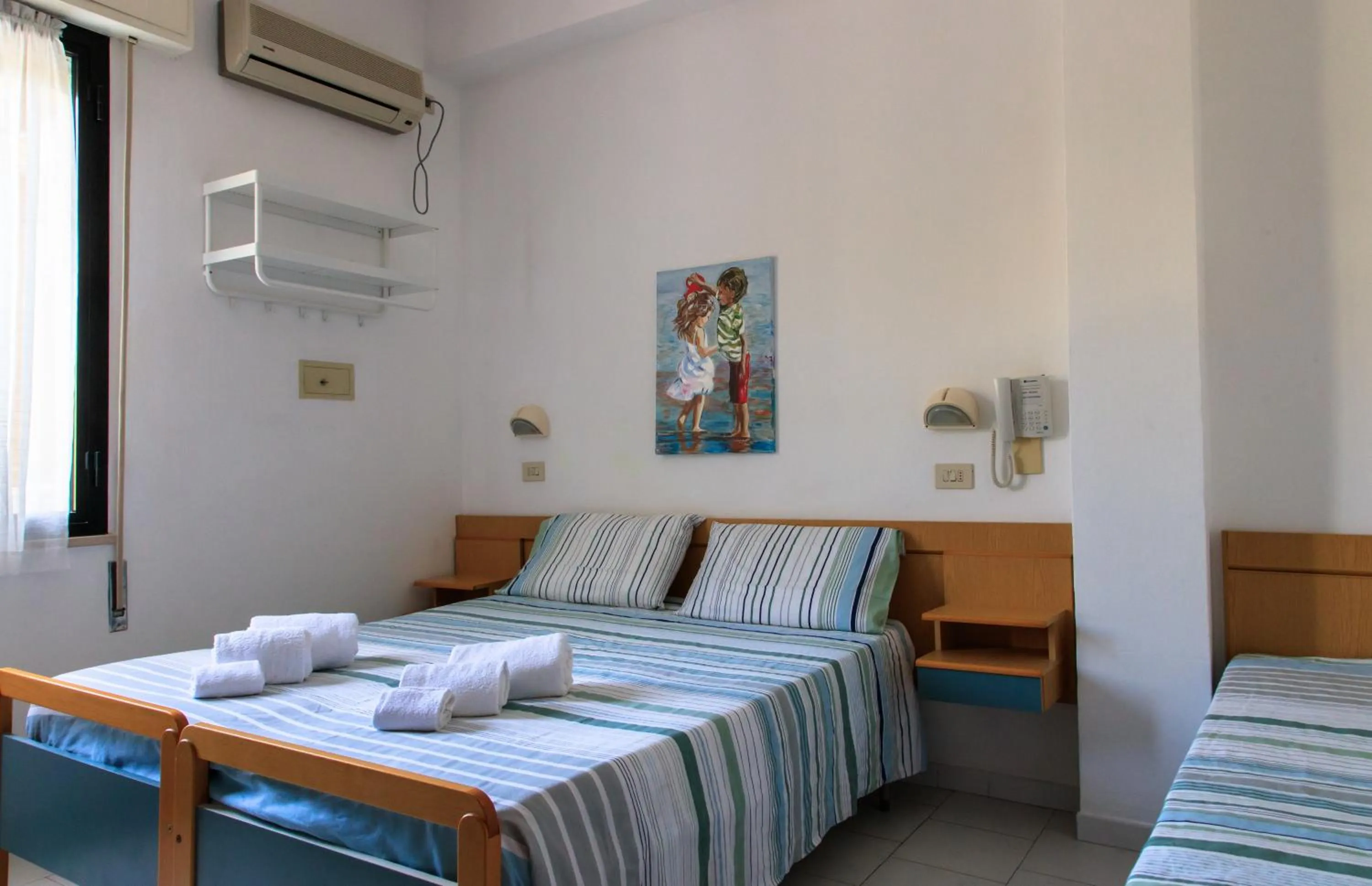 Bedroom, Bed in Hotel Riziana