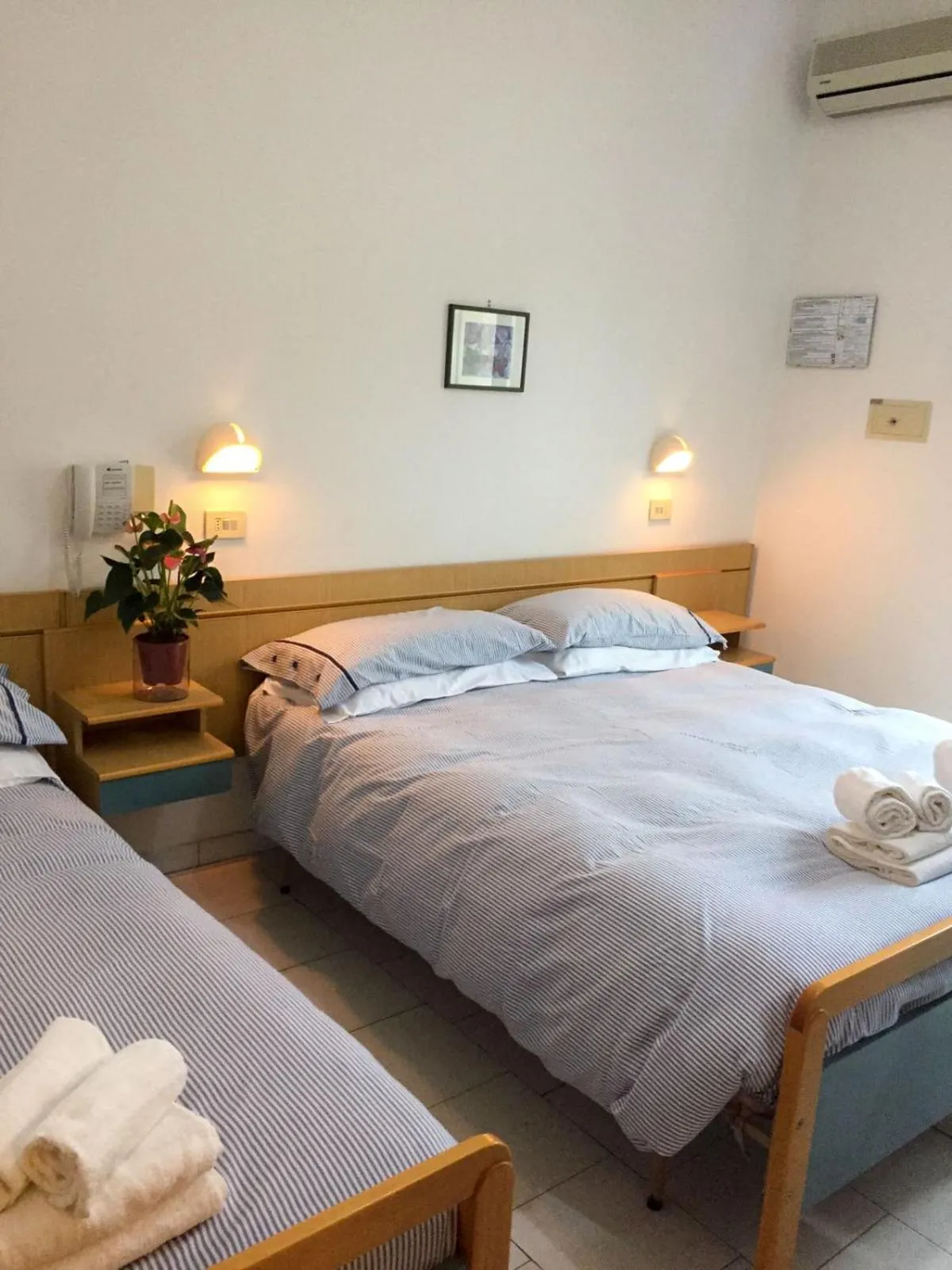 Bed in Hotel Riziana