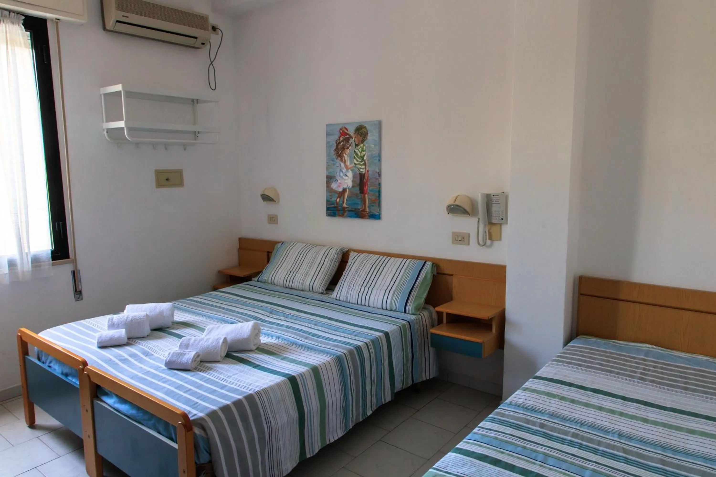 Bedroom, Bed in Hotel Riziana