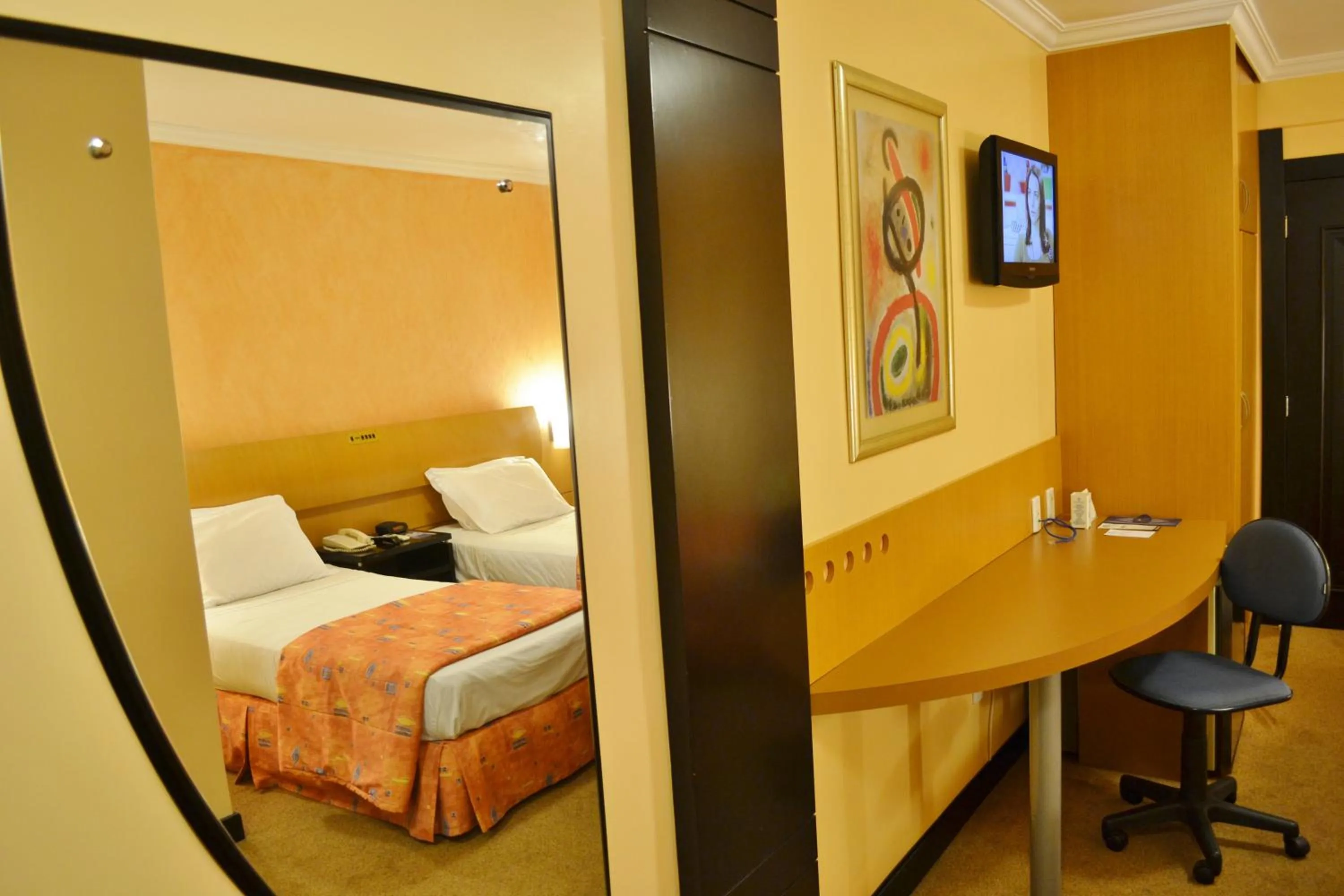 Bed in Itatiaia Hotel Passo Fundo